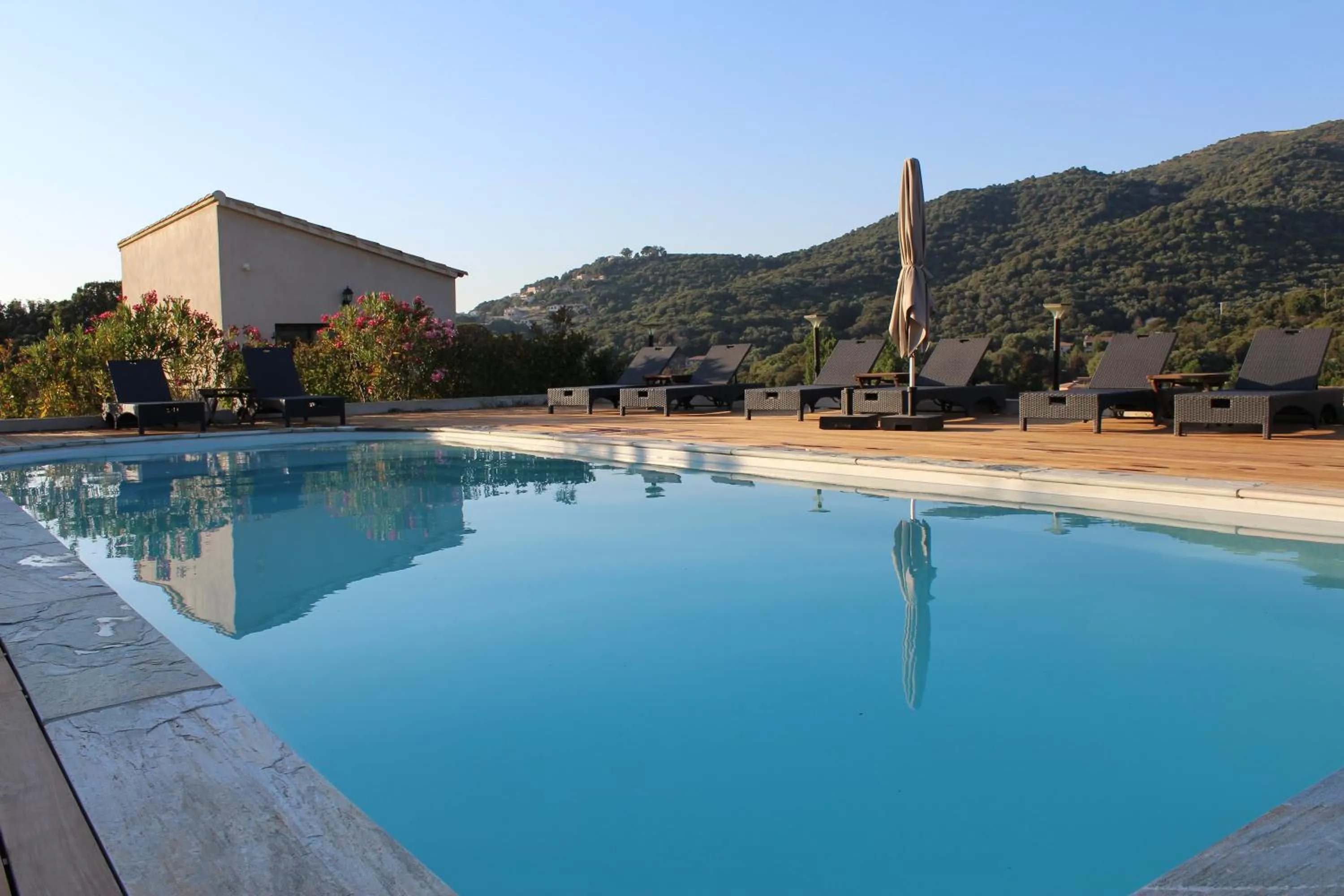 Swimming pool in Hotel & Restaurant Les Bergeries d'Alata