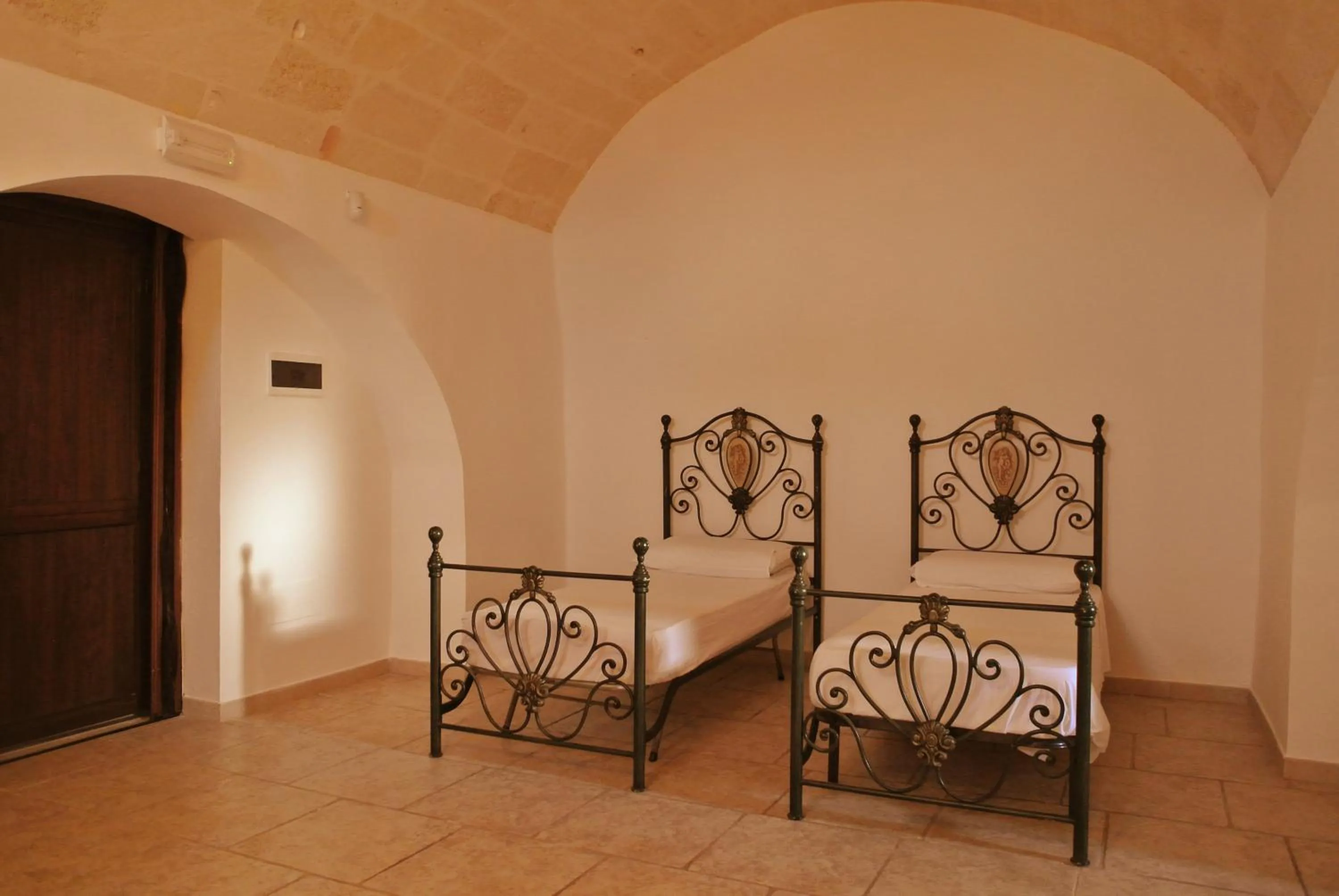 Photo of the whole room, Bed in Masseria Nuova