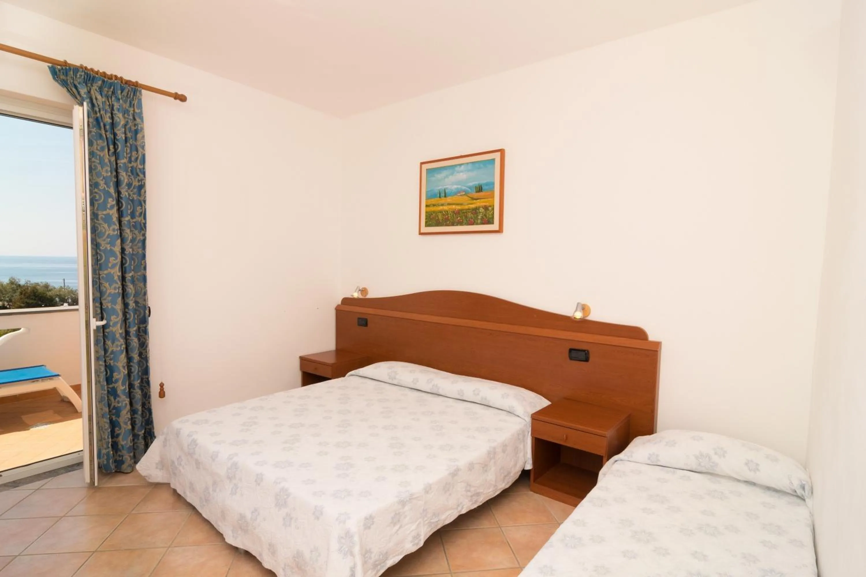 Bedroom in Hotel Villa Fumerie