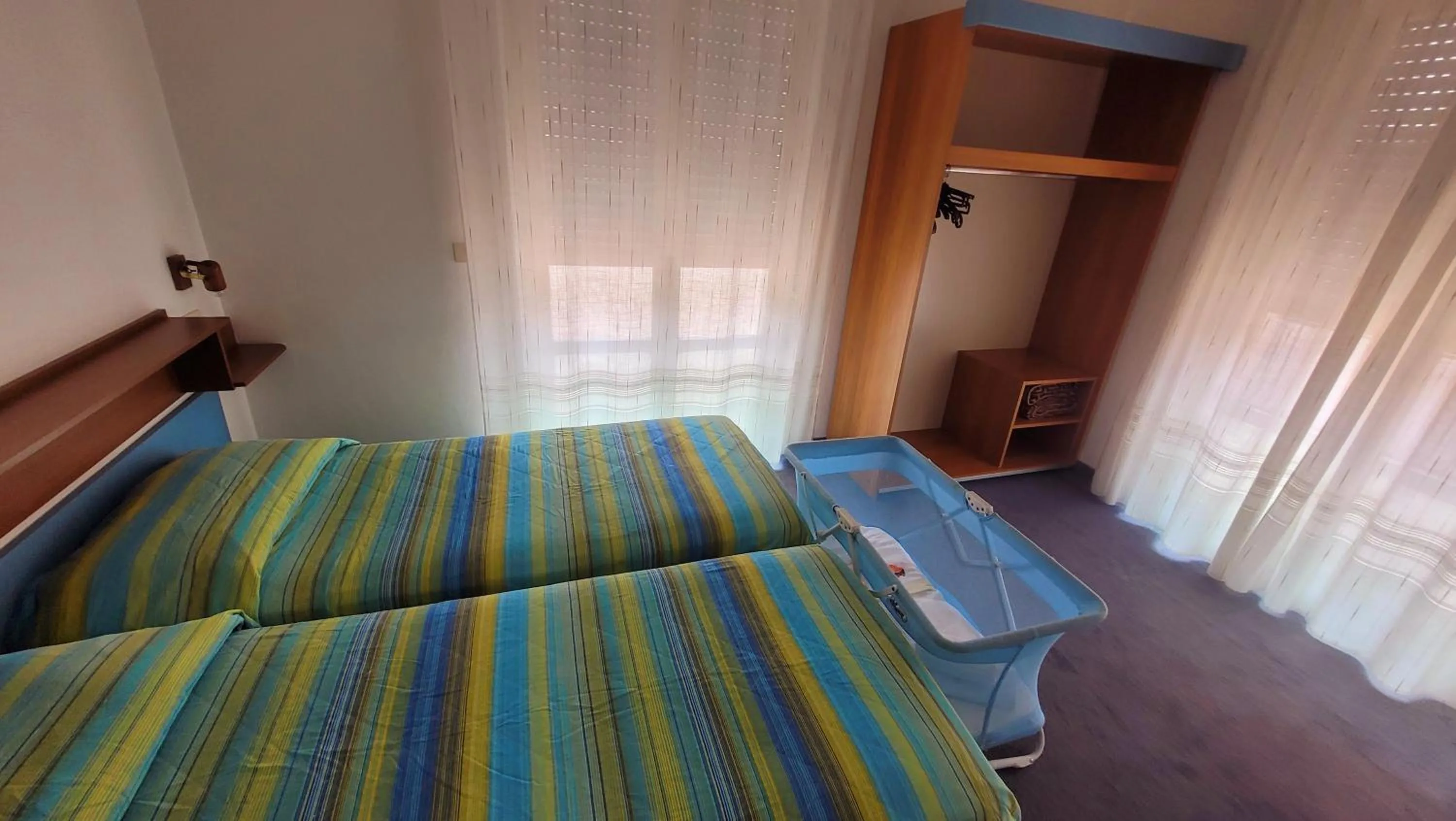 Bed in Albergo Villa Mimosa