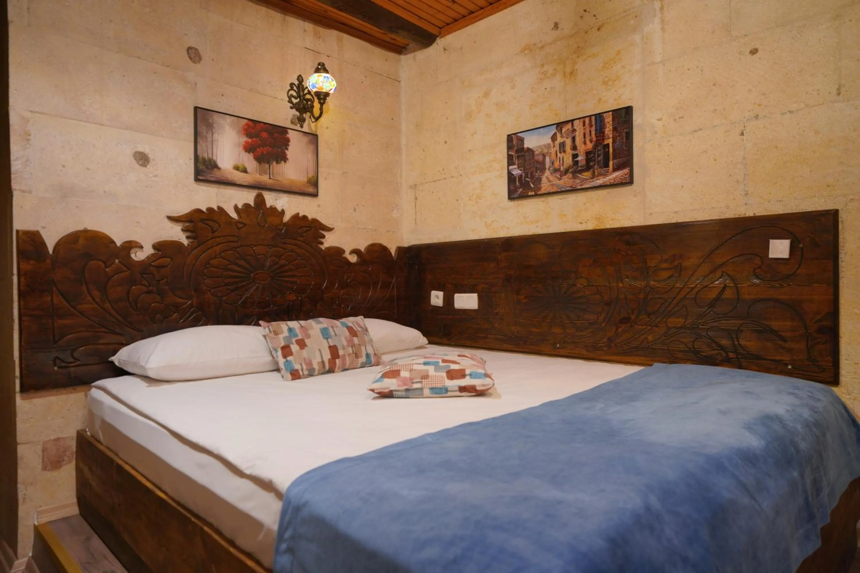 Bed in Mira Cappadocia Hotel