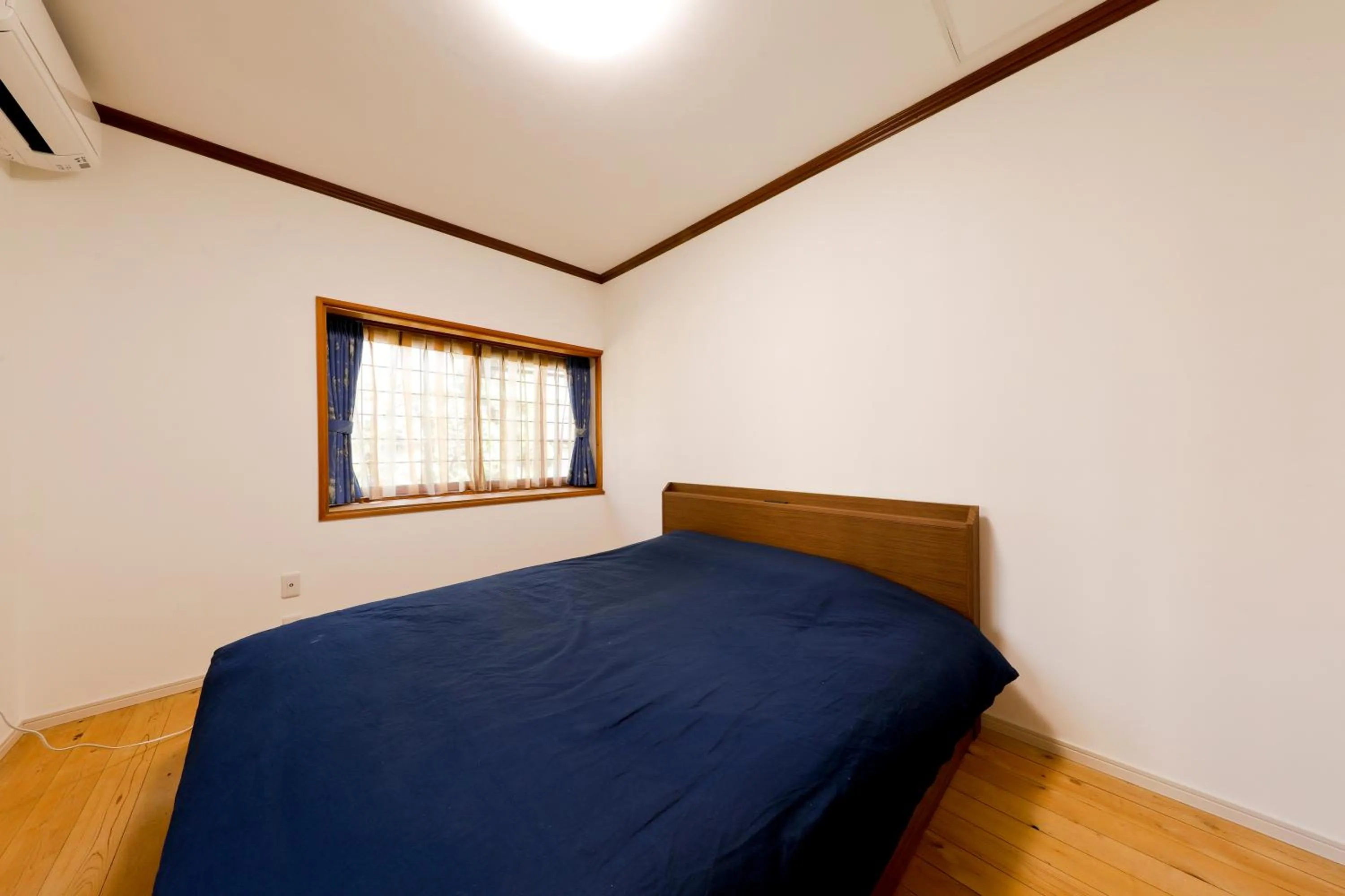 Bed in 庭之宿 新大阪日本庭園の家 -Residence inn Niwanoyado-