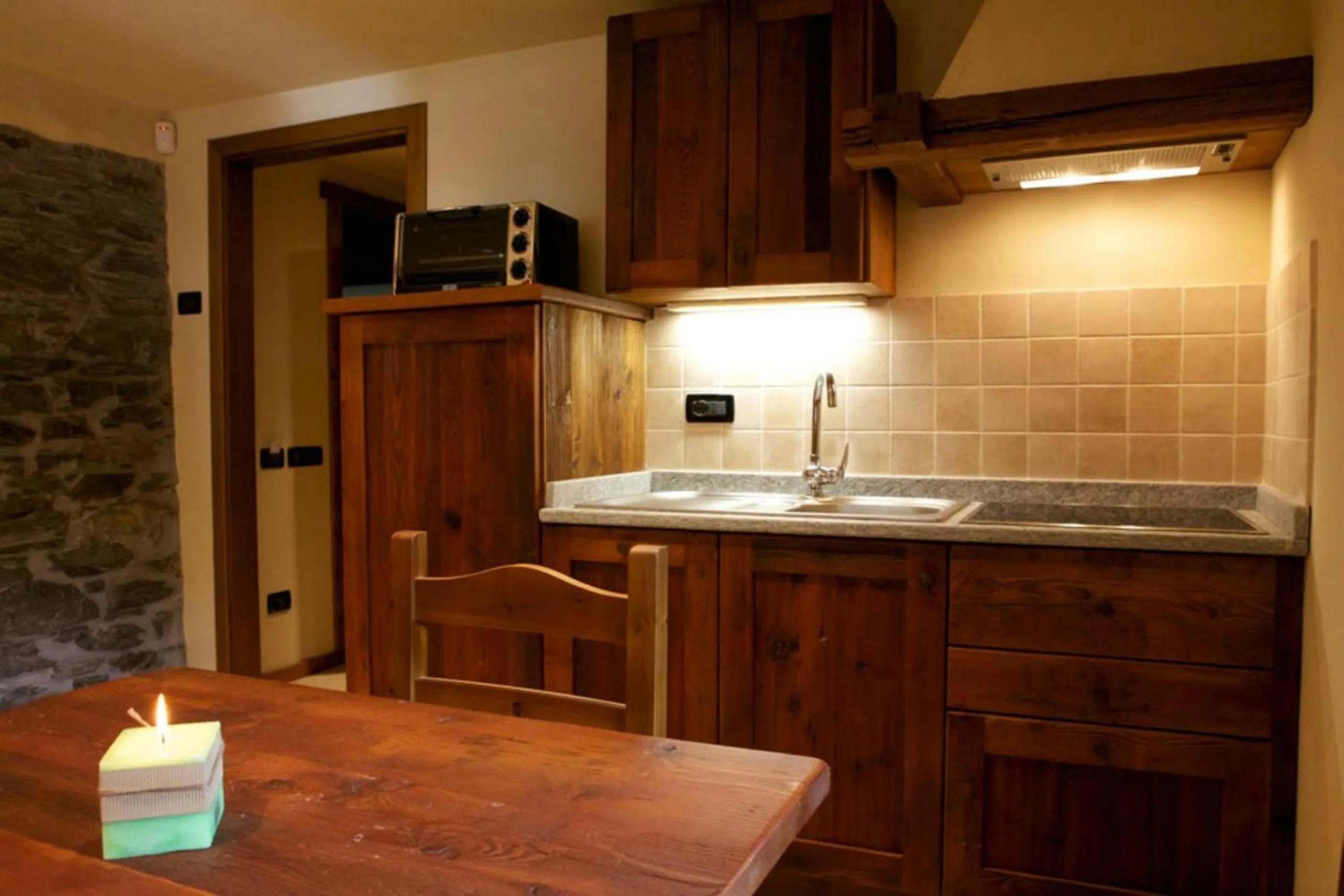 Kitchen or kitchenette in Le Petit Coeur Residence De Montagne
