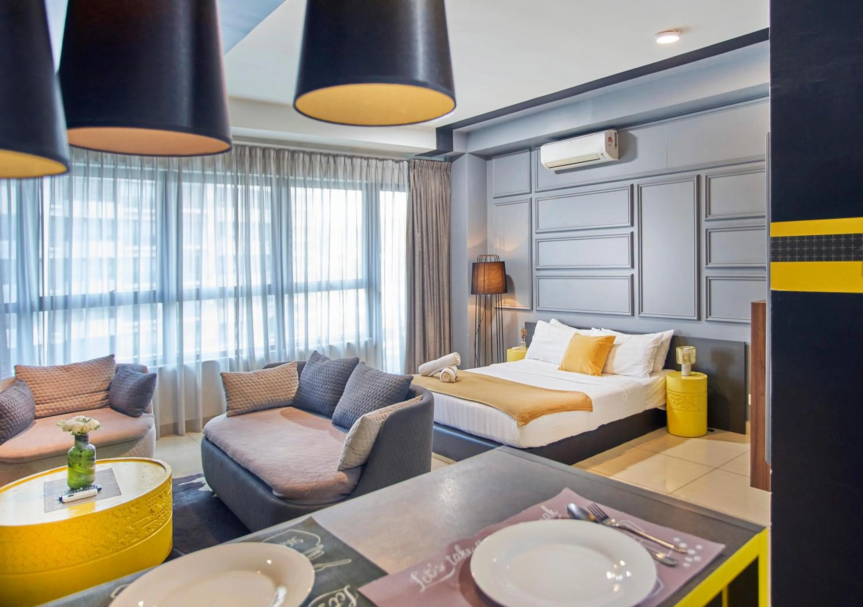 Bed in Arte Plus KLCC Designer Suites by Cobnb