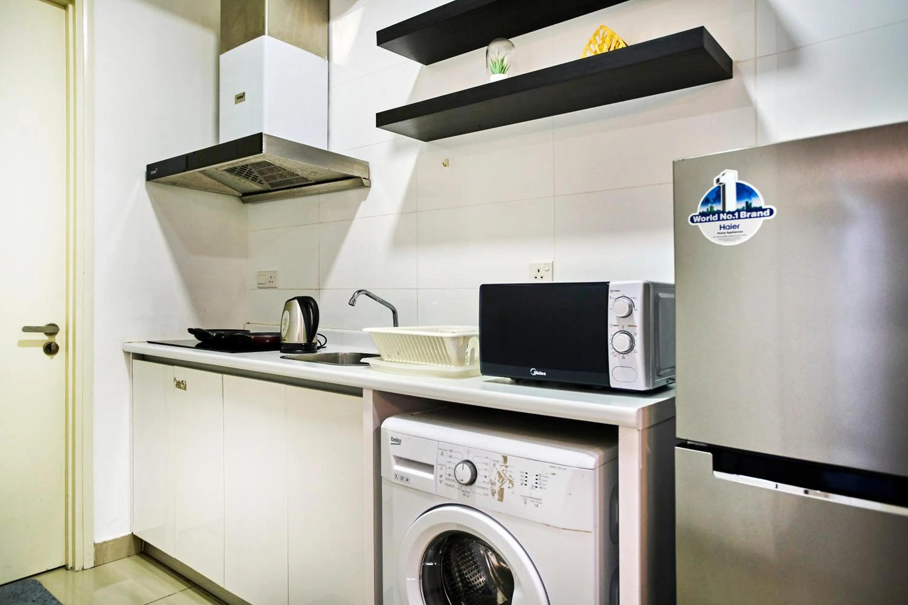 Kitchen or kitchenette in Arte Plus KLCC Designer Suites by Cobnb