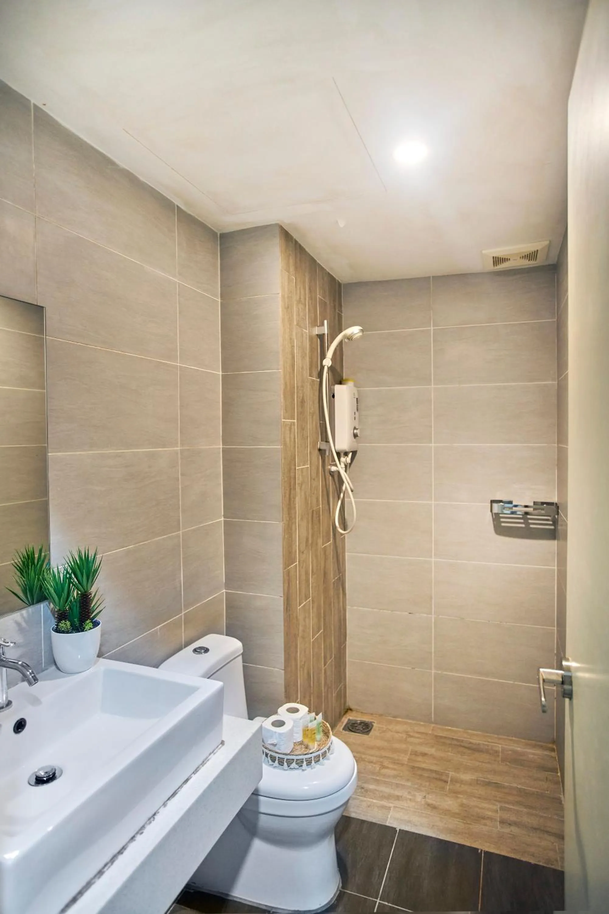 Shower in Arte Plus KLCC Designer Suites by Cobnb