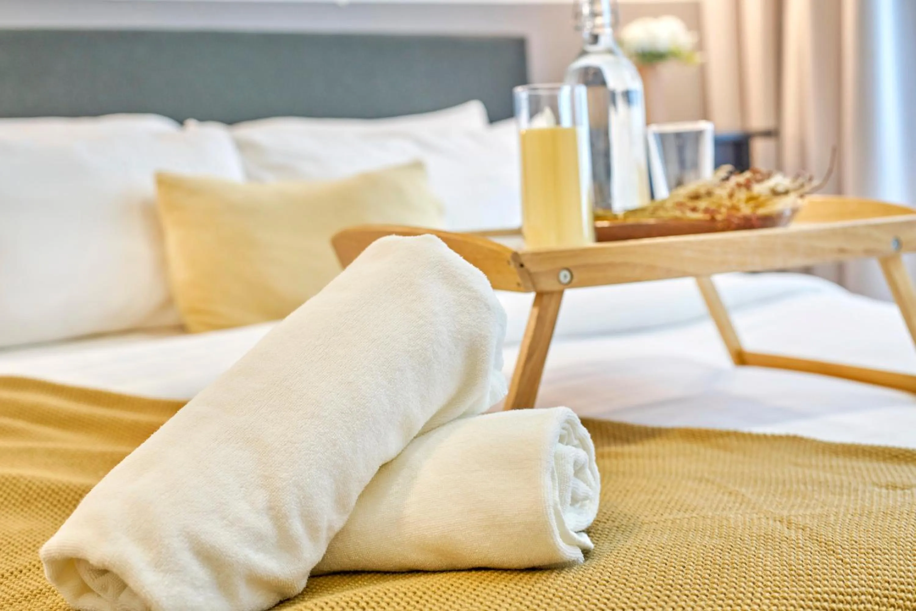 towels, Bed in Arte Plus KLCC Designer Suites by Cobnb