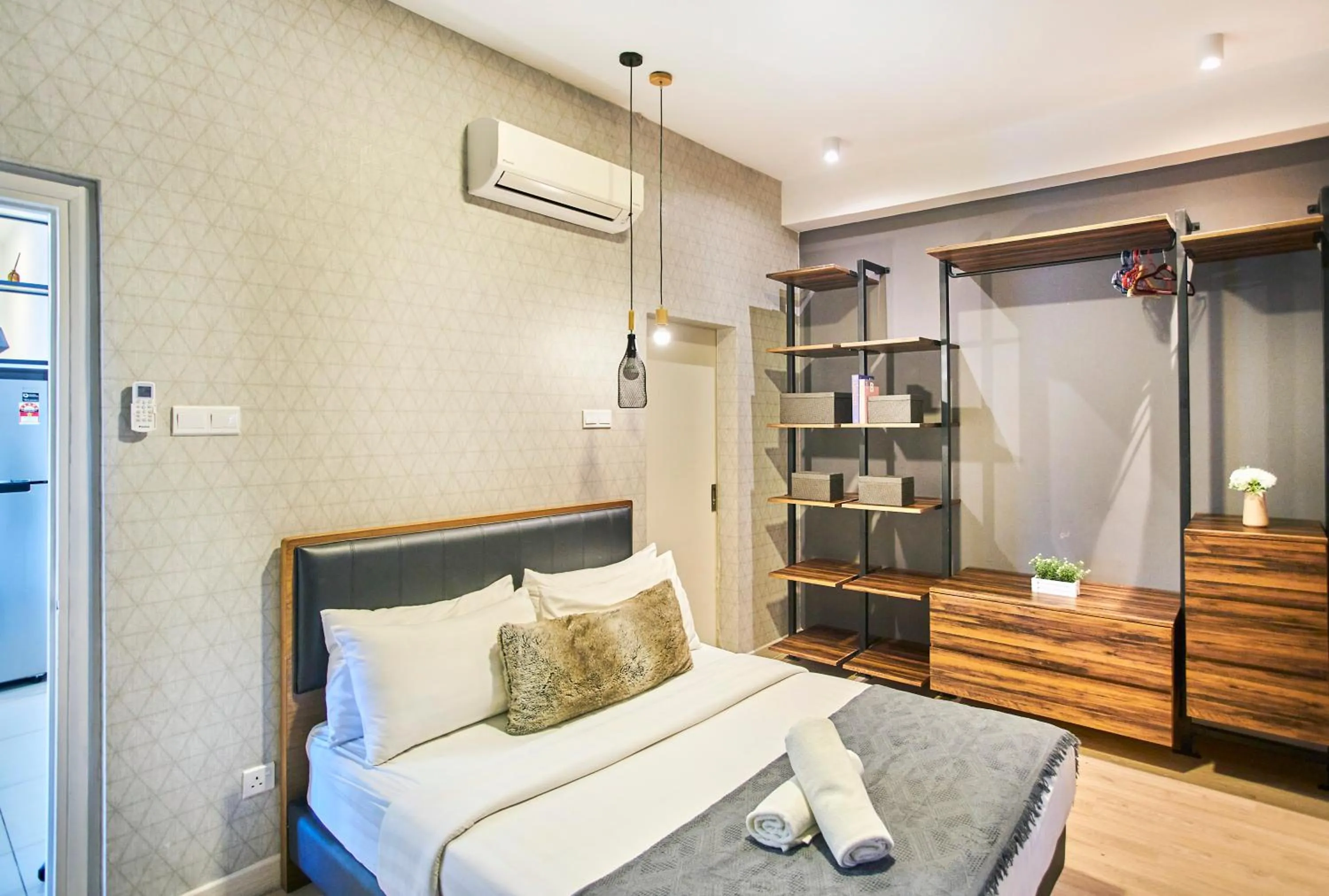 Bed in Arte Plus KLCC Designer Suites by Cobnb