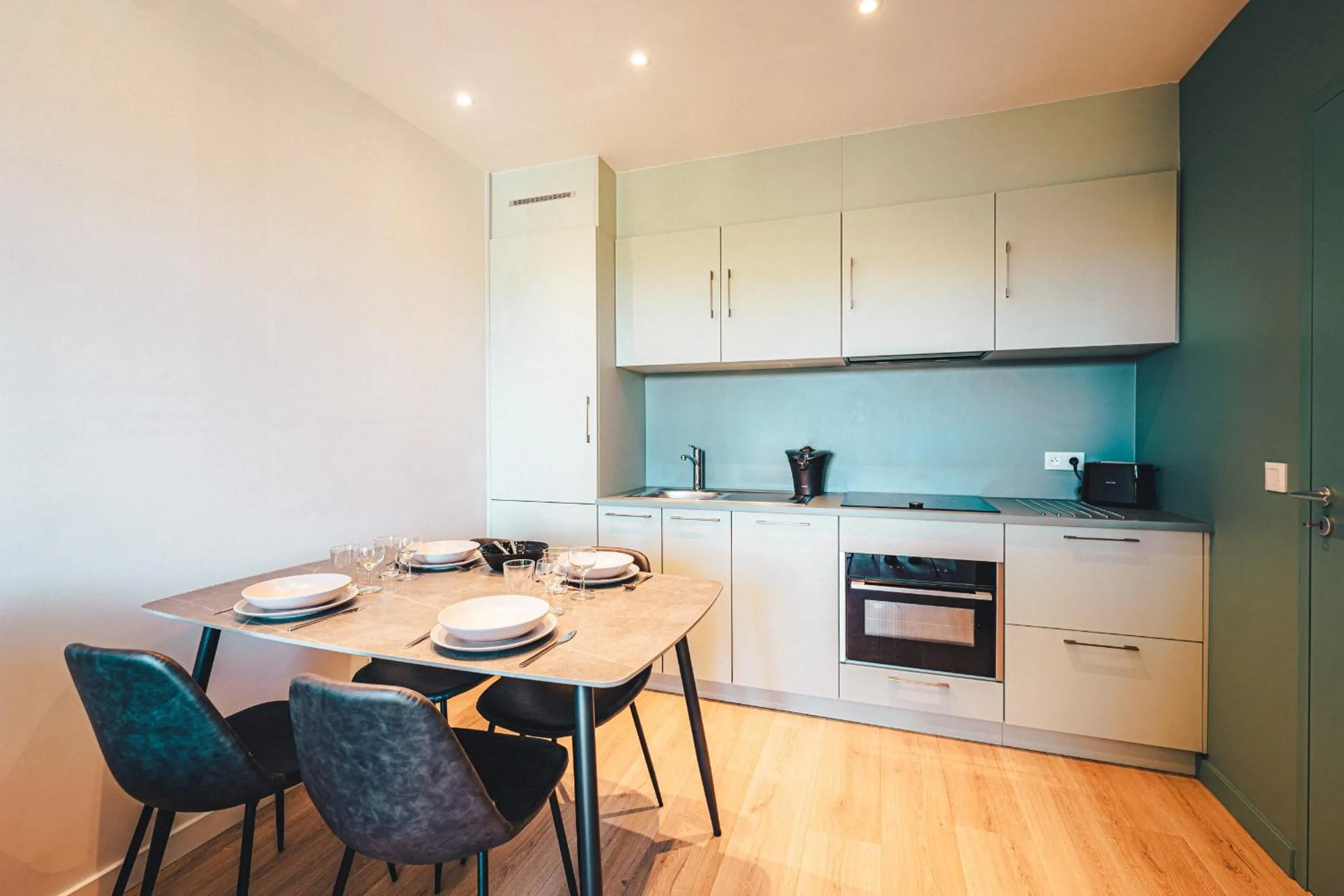 Kitchen or kitchenette in Le Suffren Hôtel