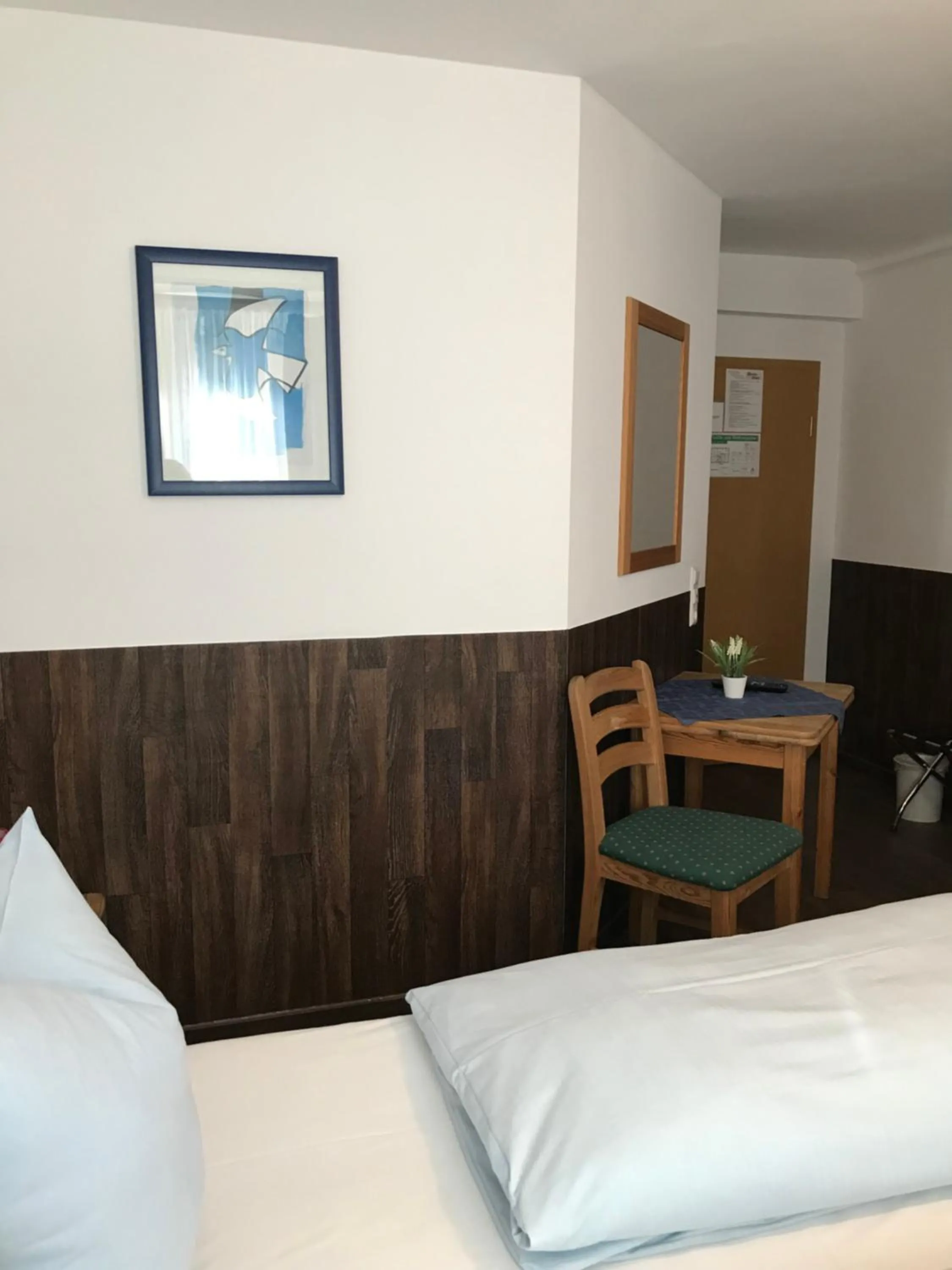 Bed in Hotel Guntia Boardinghouse virtueller check in und Zimmer Zugang
