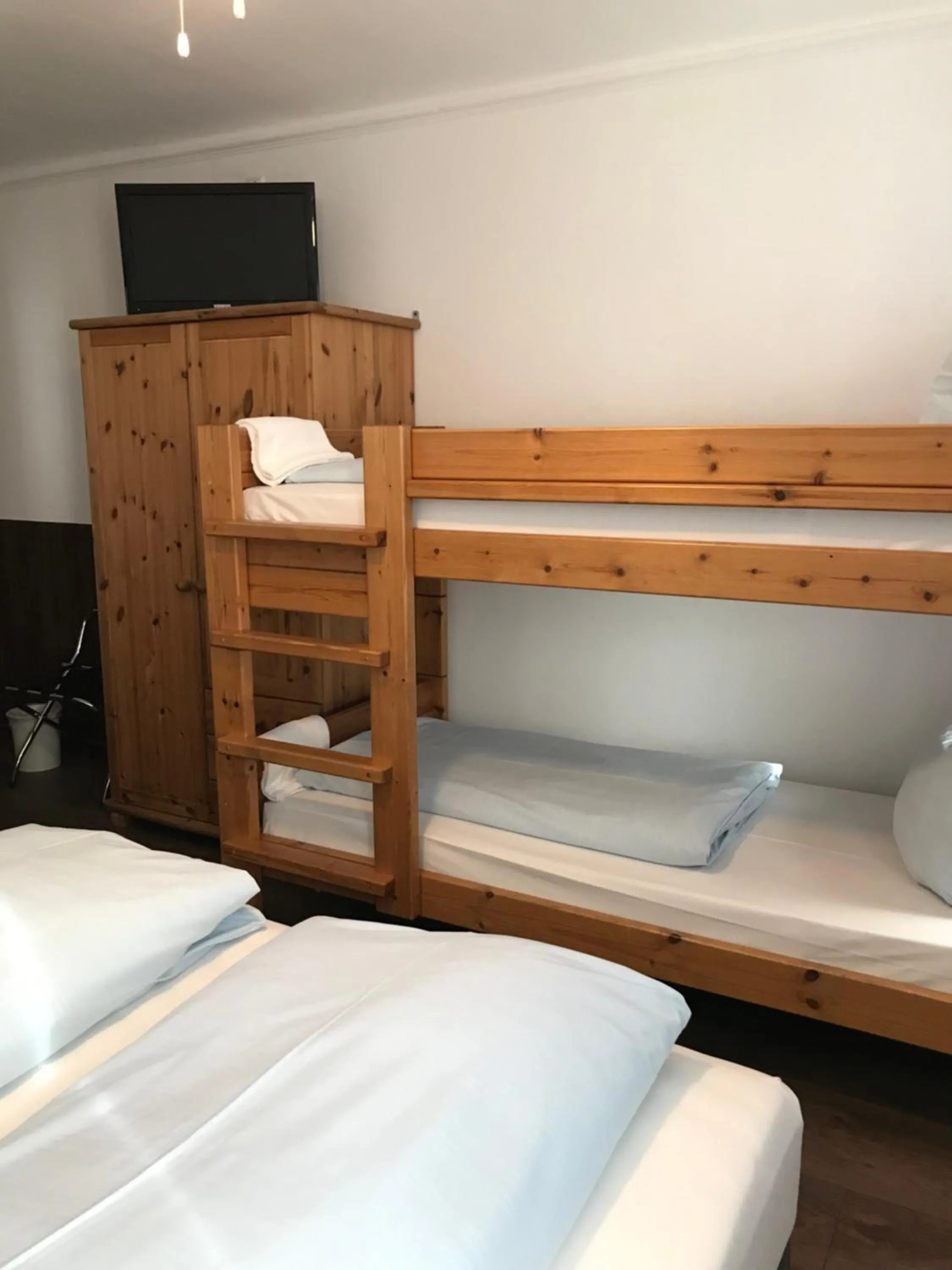 Bed in Hotel Guntia Boardinghouse virtueller check in und Zimmer Zugang
