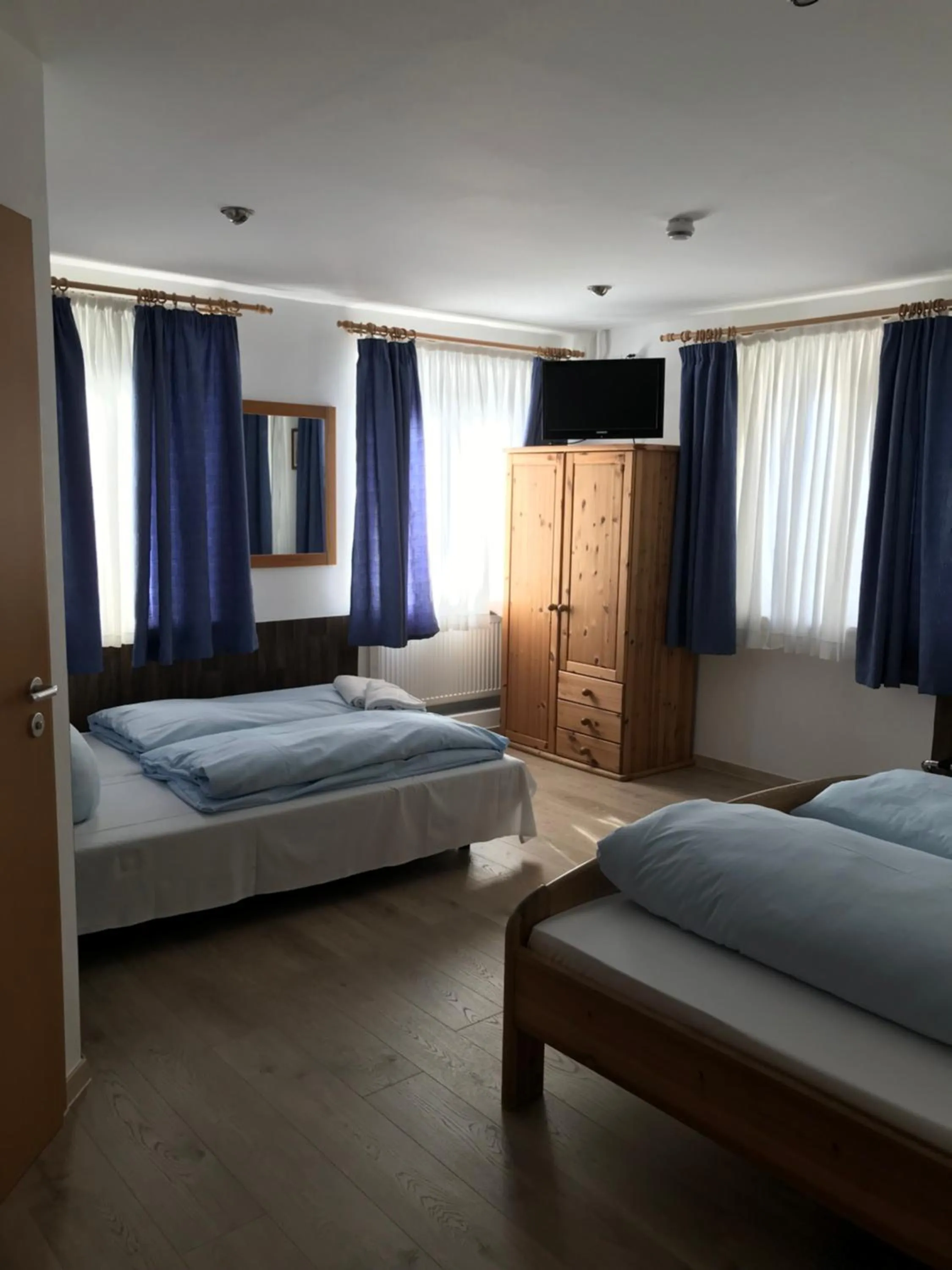 Bed in Hotel Guntia Boardinghouse virtueller check in und Zimmer Zugang