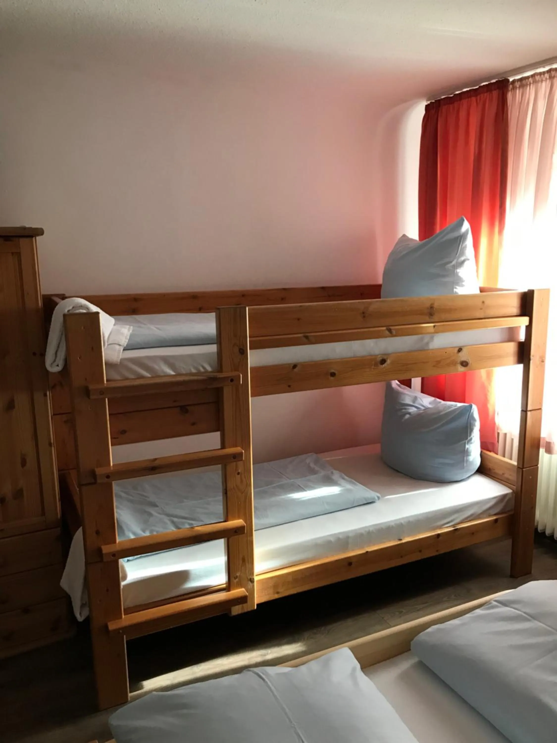 Bed in Hotel Guntia Boardinghouse virtueller check in und Zimmer Zugang