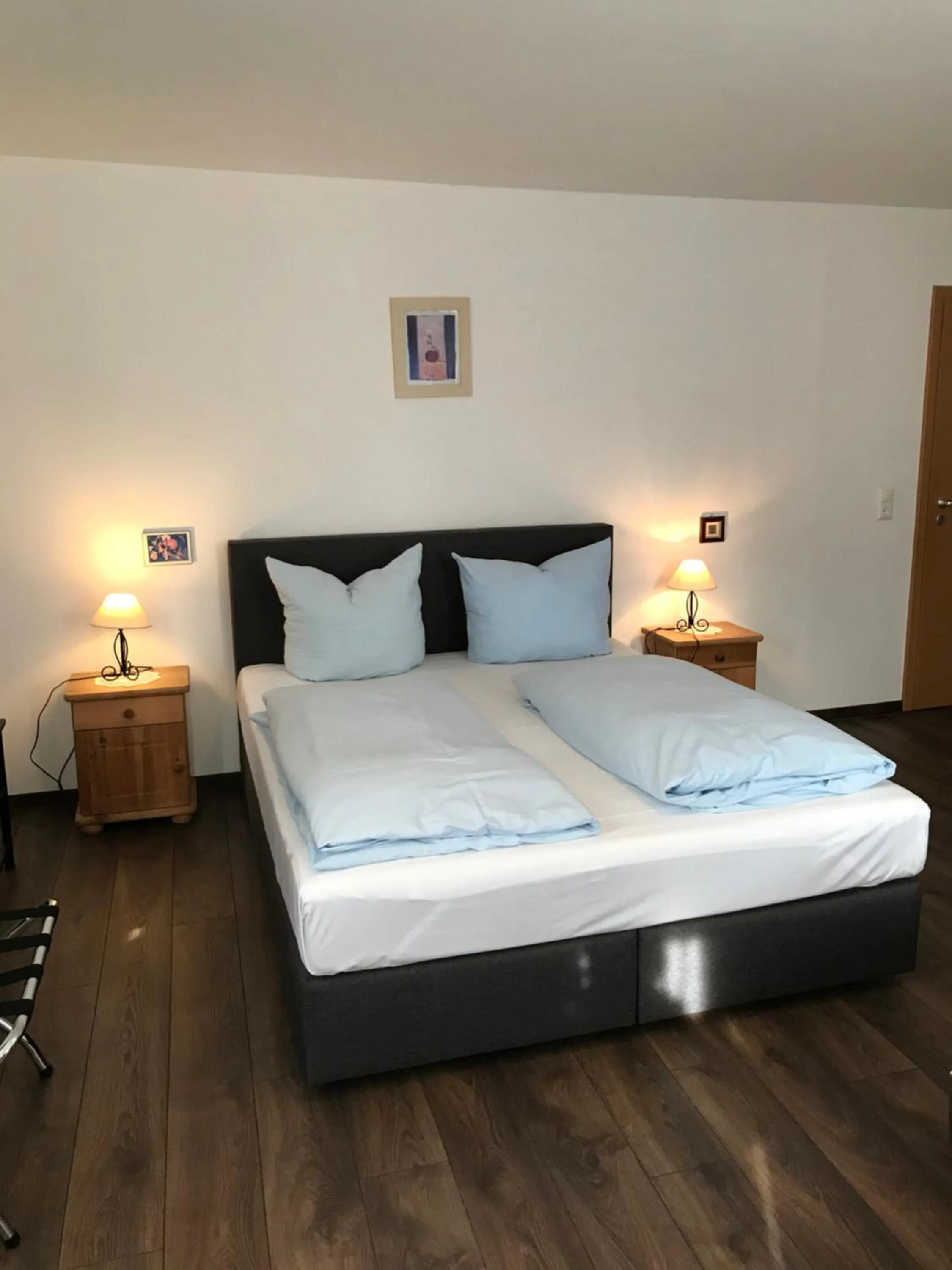 Bed in Hotel Guntia Boardinghouse virtueller check in und Zimmer Zugang