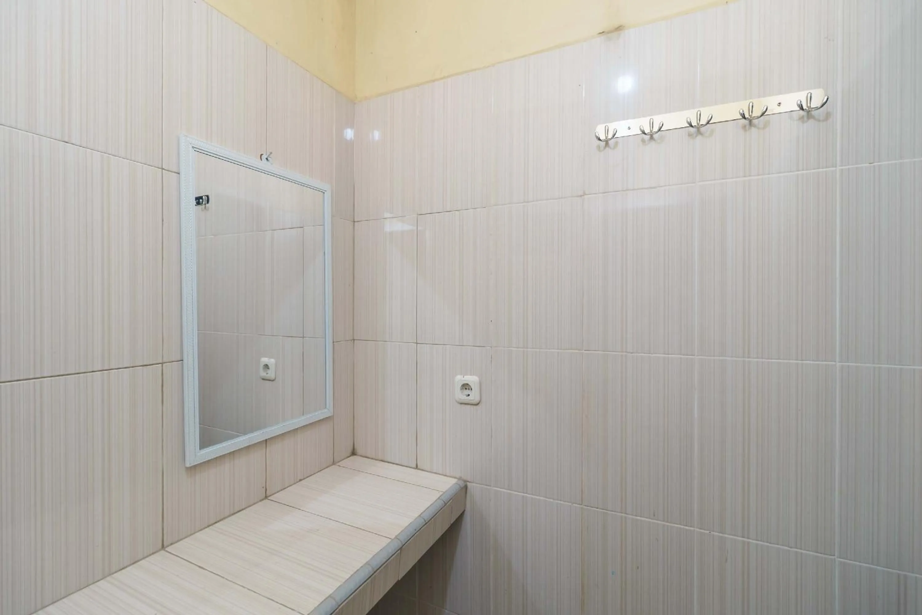 Bathroom in RedDoorz Syariah @ Mora Garden Bungo