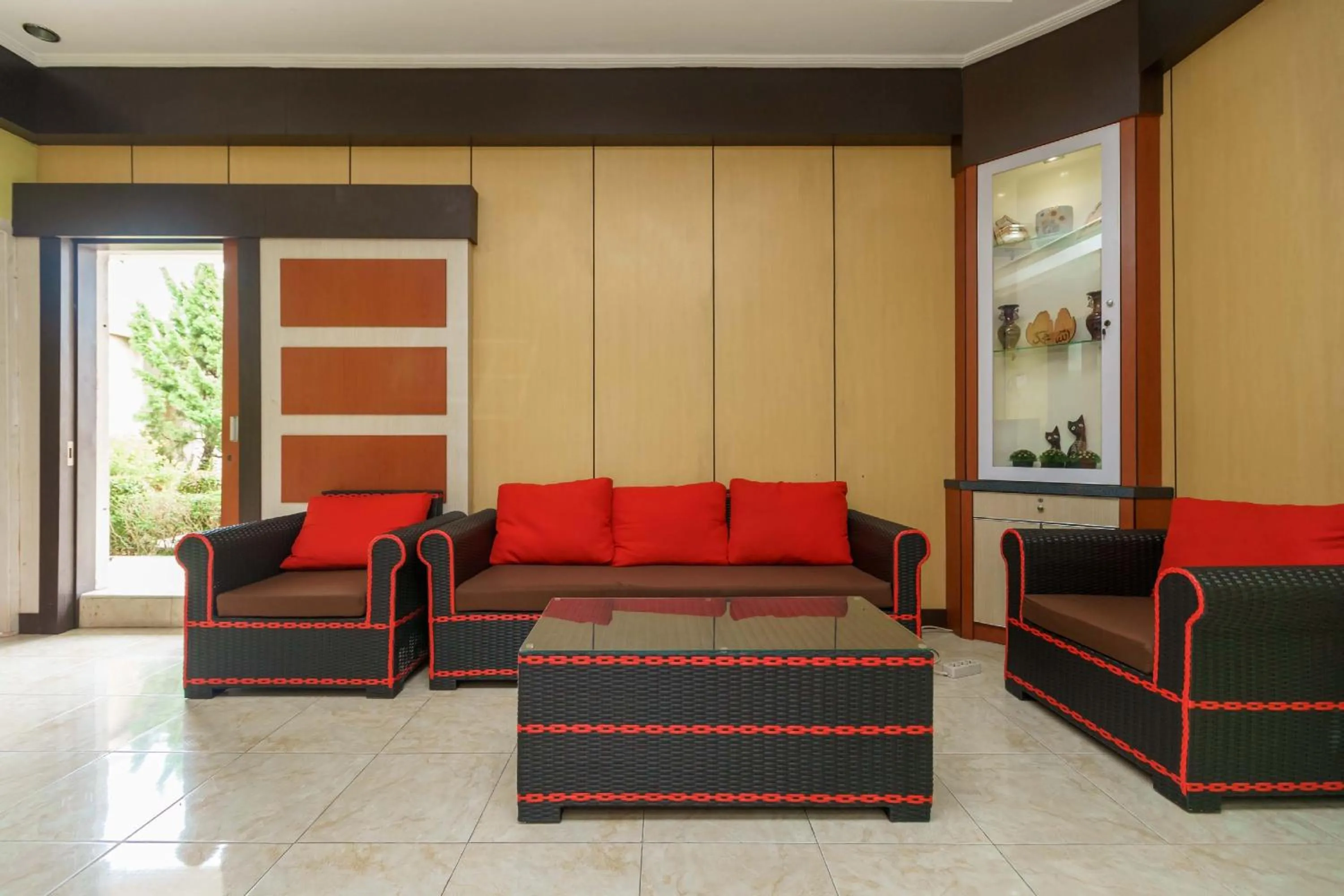 Living room in RedDoorz Syariah @ Mora Garden Bungo