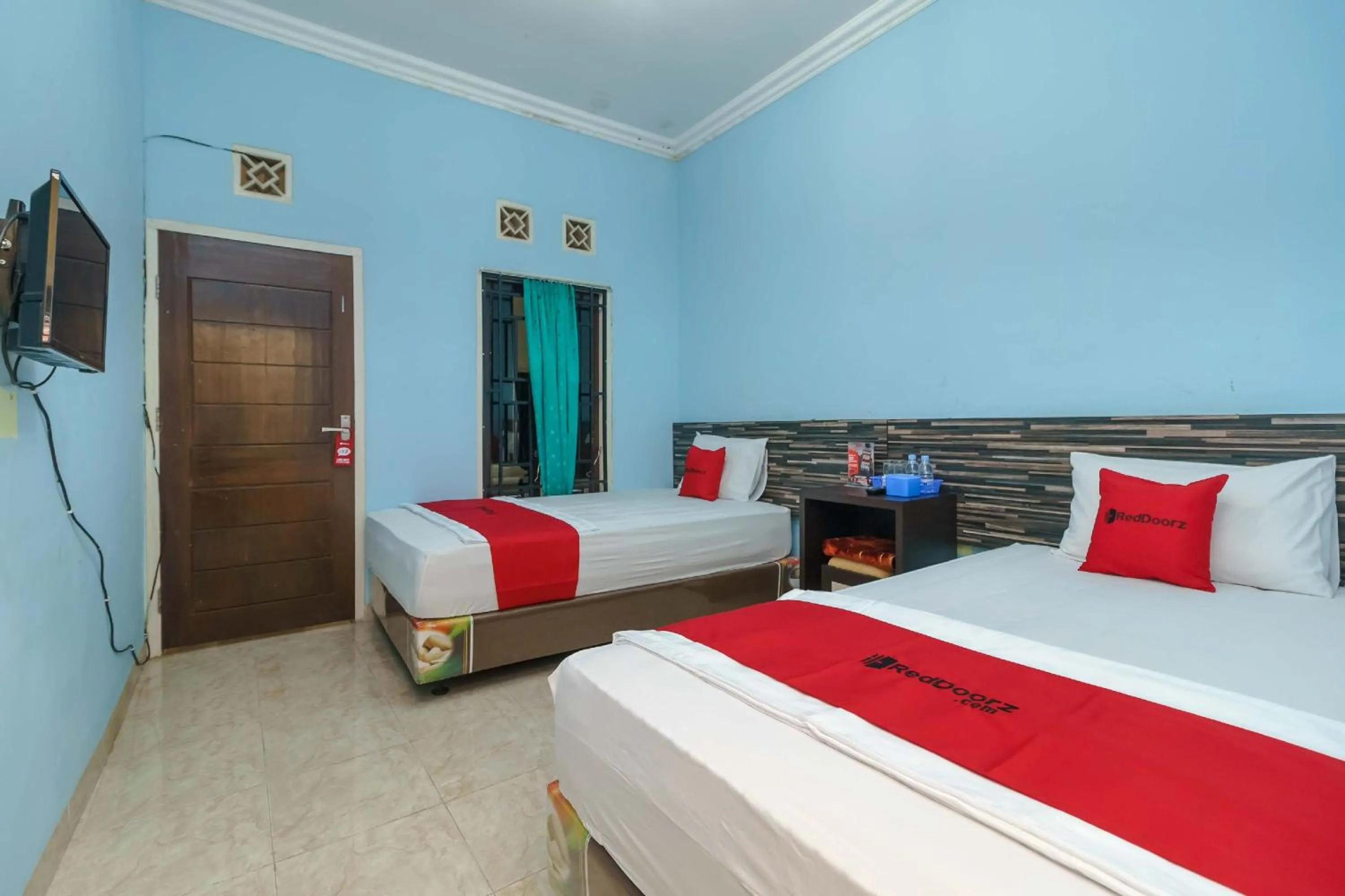 Bedroom, Bed in RedDoorz Syariah @ Mora Garden Bungo