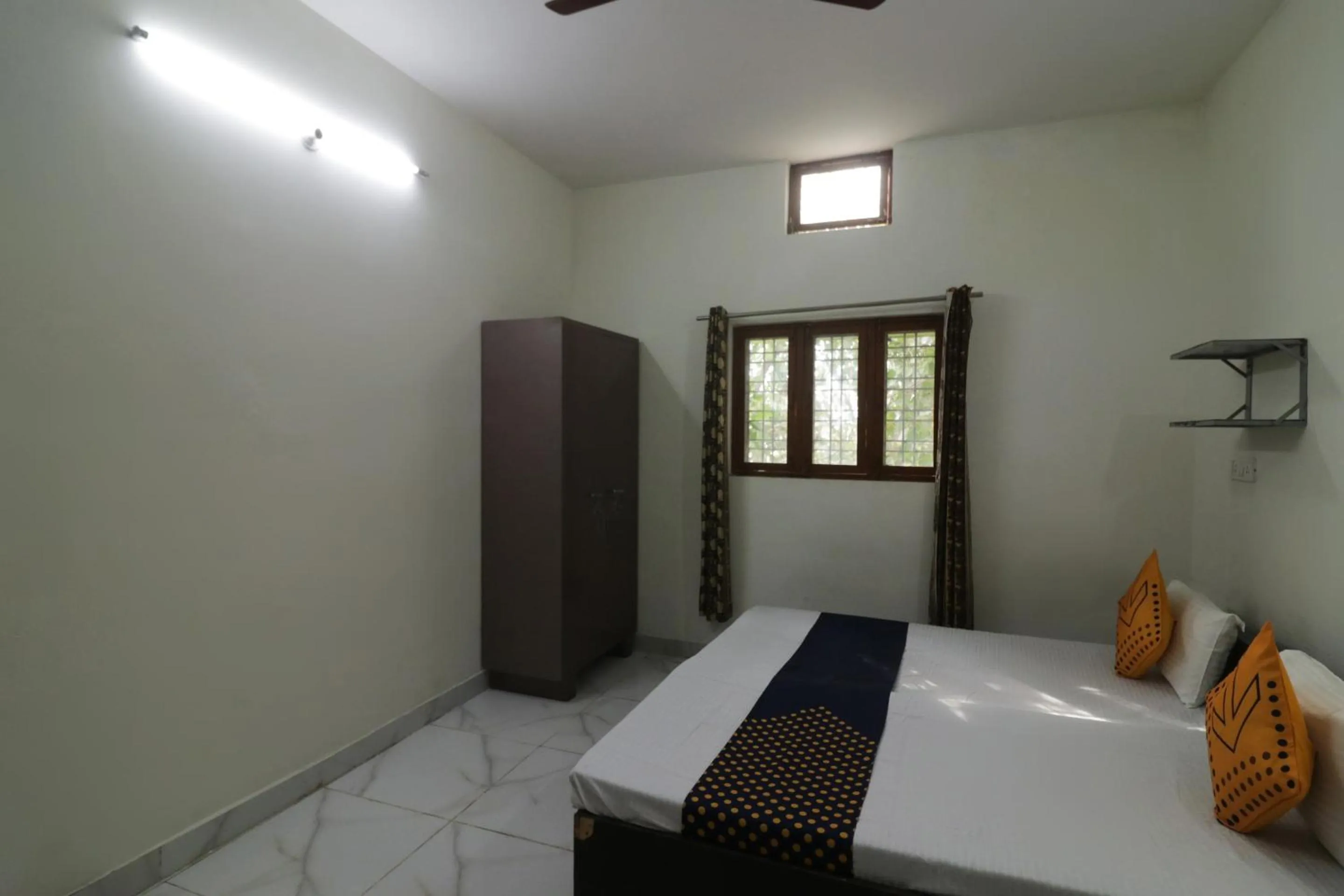 Bedroom in SPOT ON Sneha Home Stay