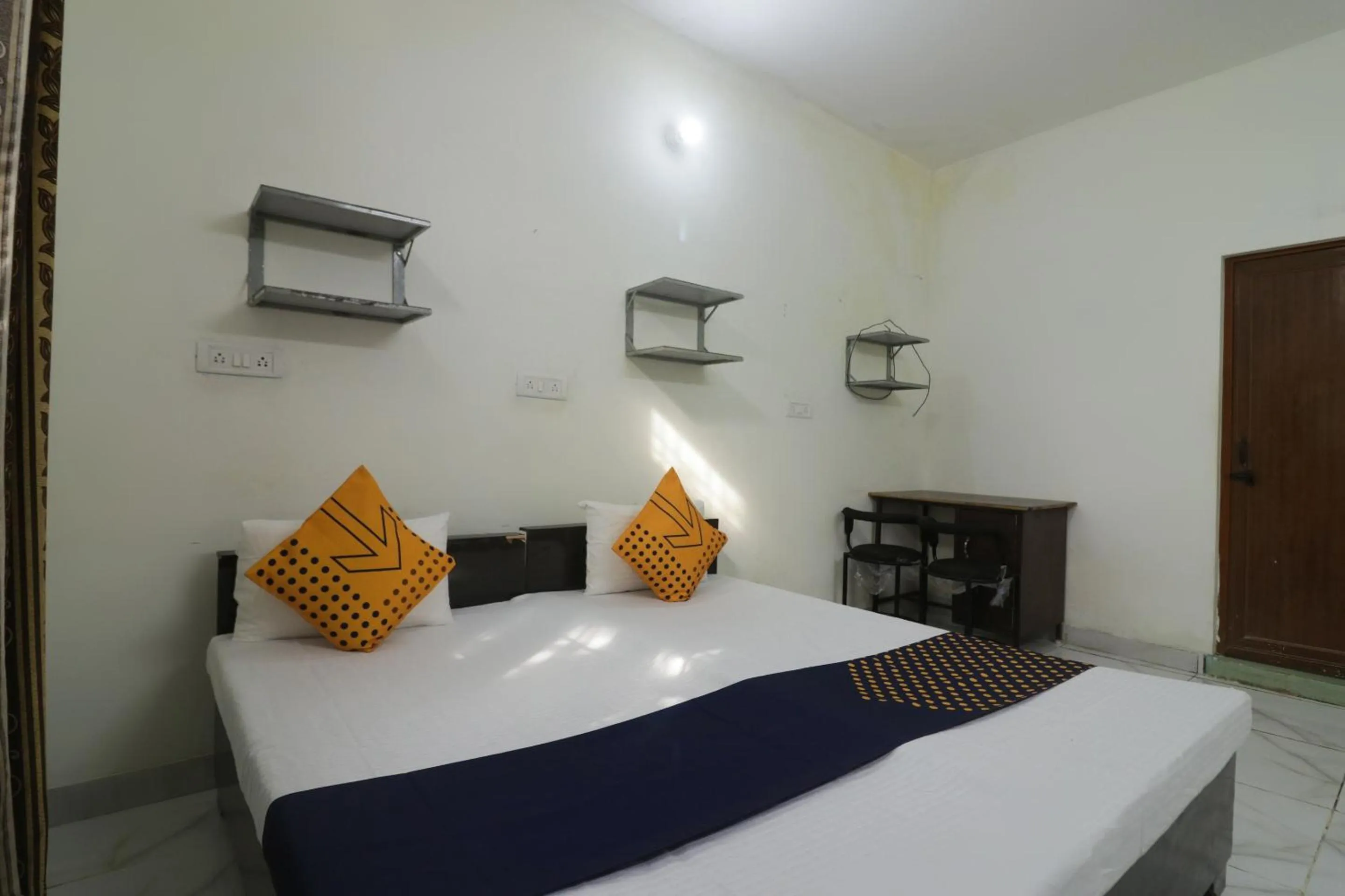 Bedroom in SPOT ON Sneha Home Stay