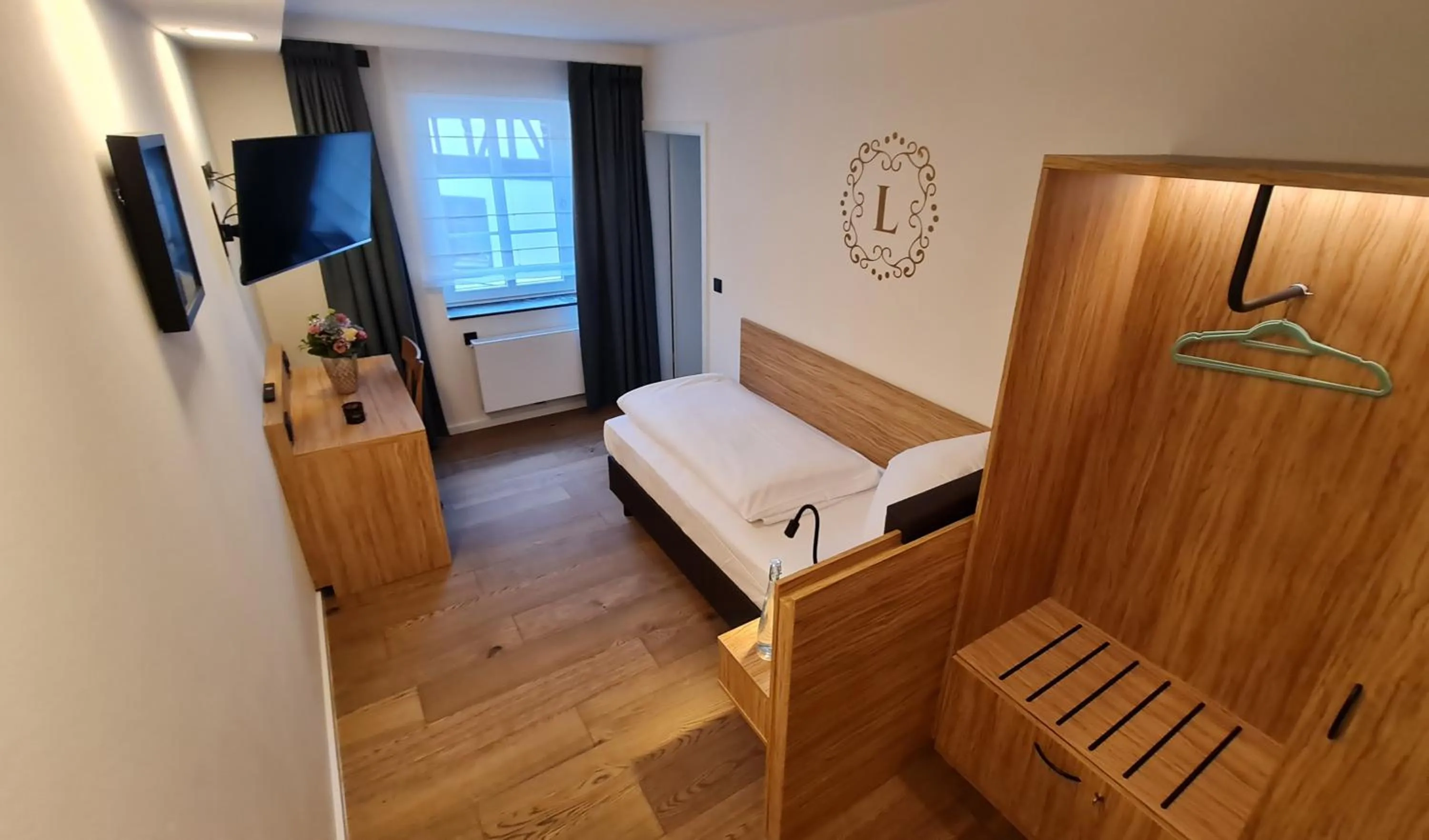 Photo of the whole room, Bed in Landgasthof zur Burg Grenzau