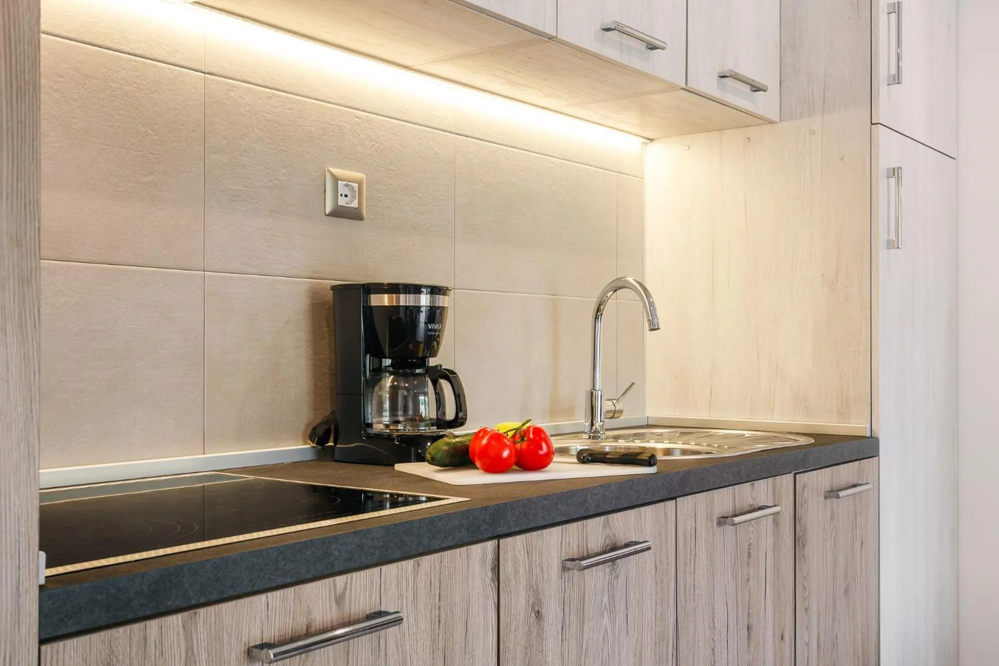 Kitchen or kitchenette in Premium Camping Homes Santa Marina, Lanterna