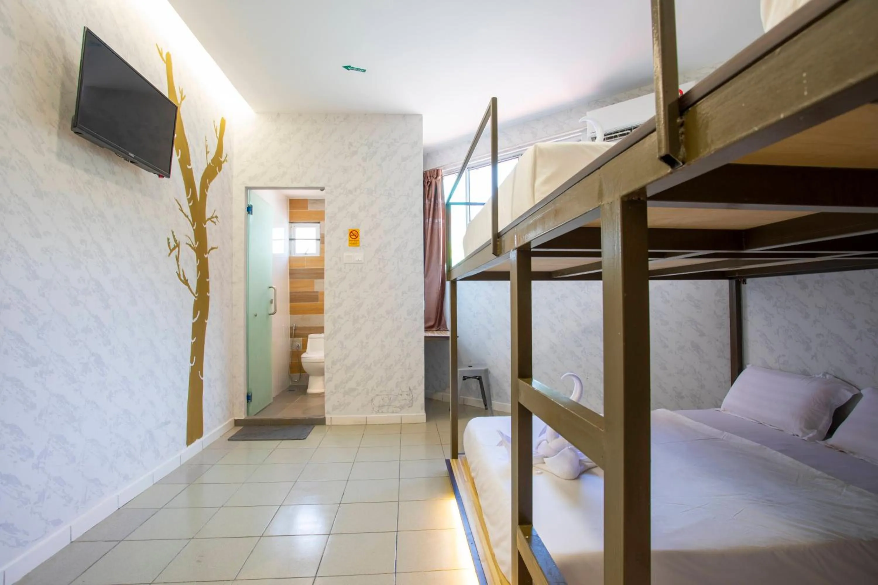 Bed in Lazy Cat Home At Gaya Street