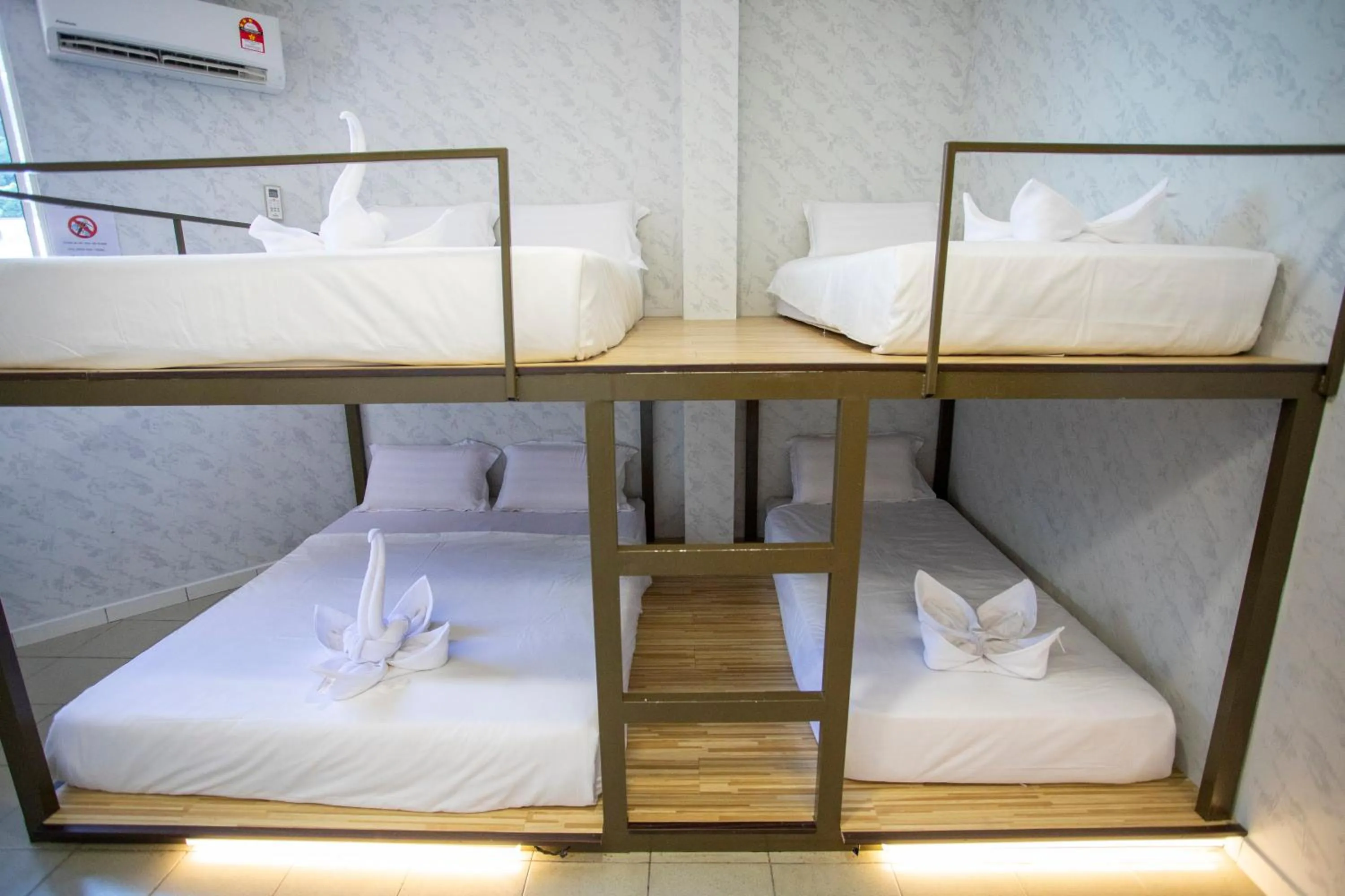 Bed in Lazy Cat Home At Gaya Street