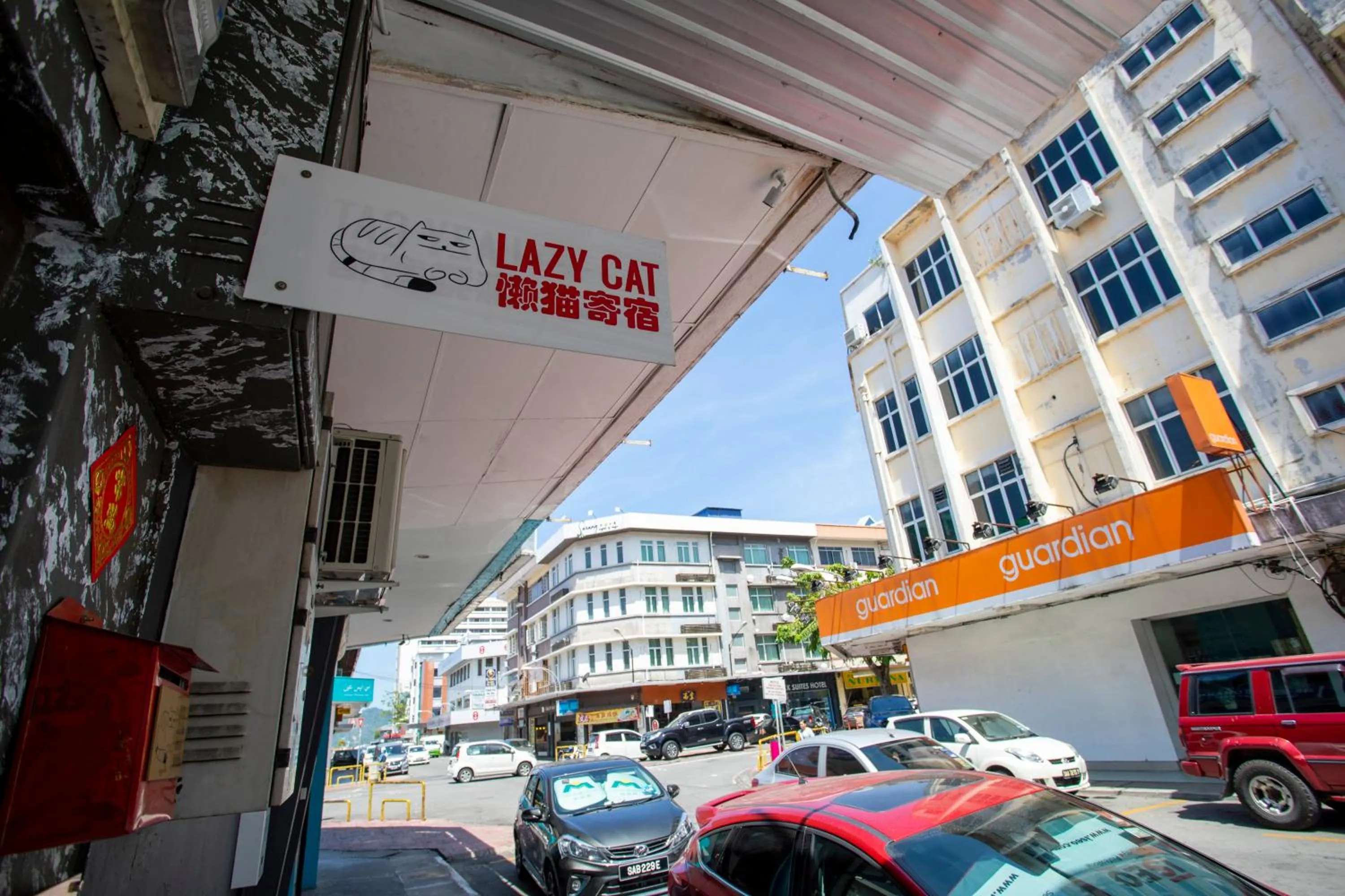 Property logo or sign in Lazy Cat Home At Gaya Street