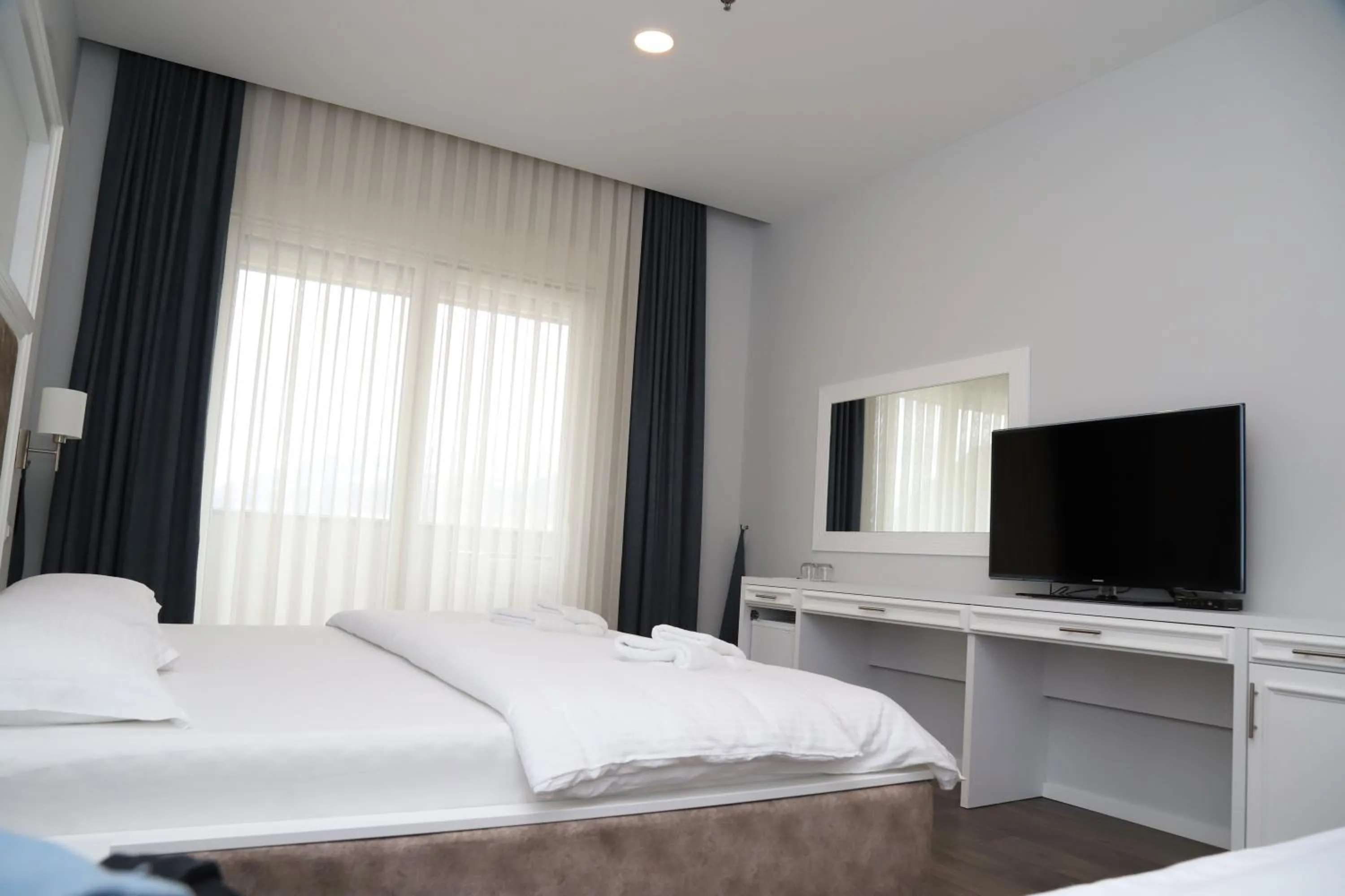 Photo of the whole room, Bed in Sky Hotel