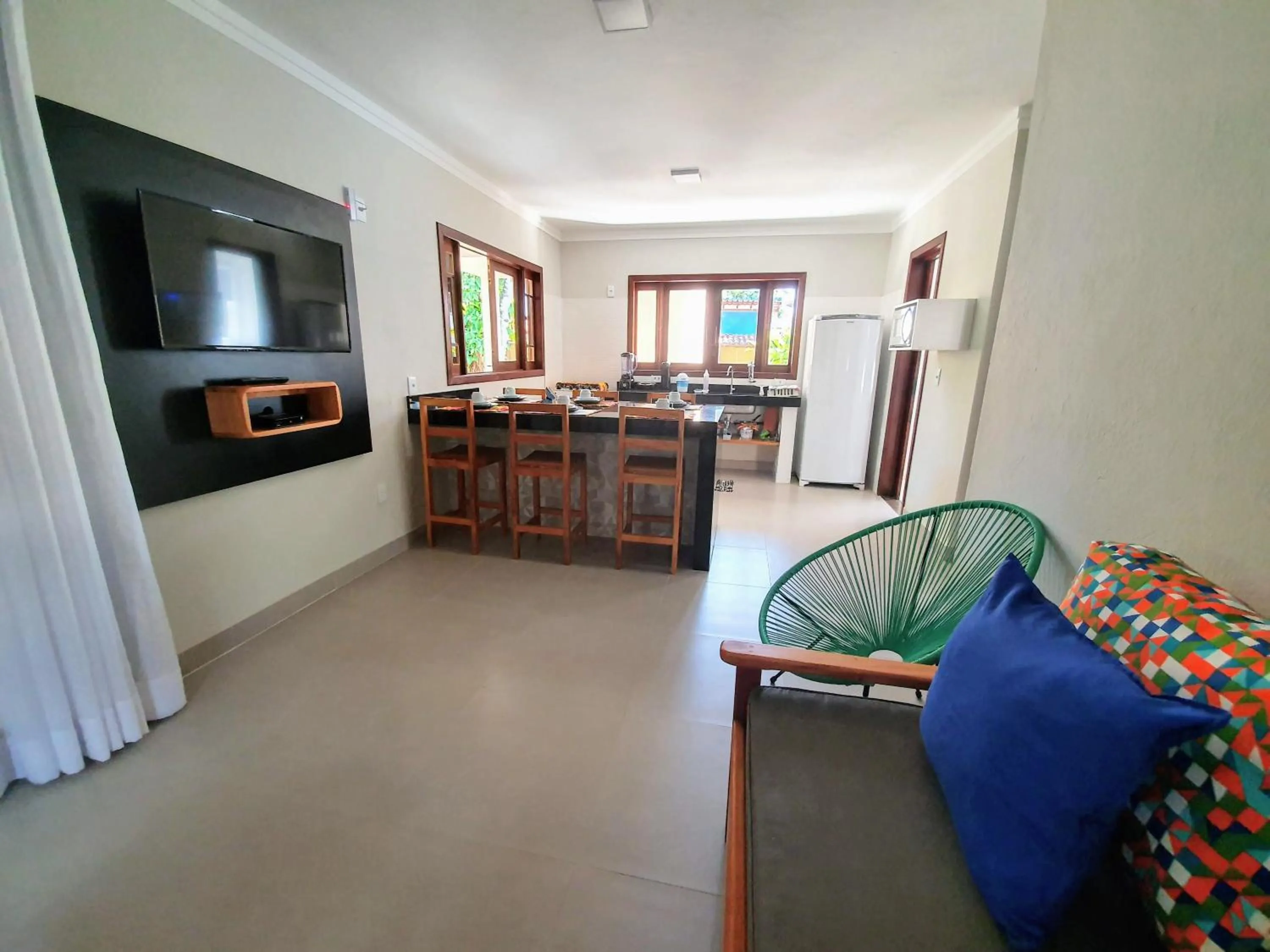 Communal lounge/ TV room in Residencial Maria Pitanga