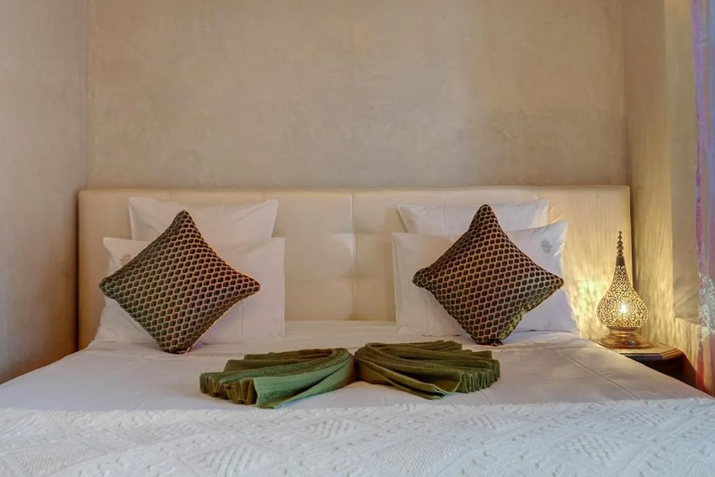 Bed in Riad Princesse Du Désert & Spa