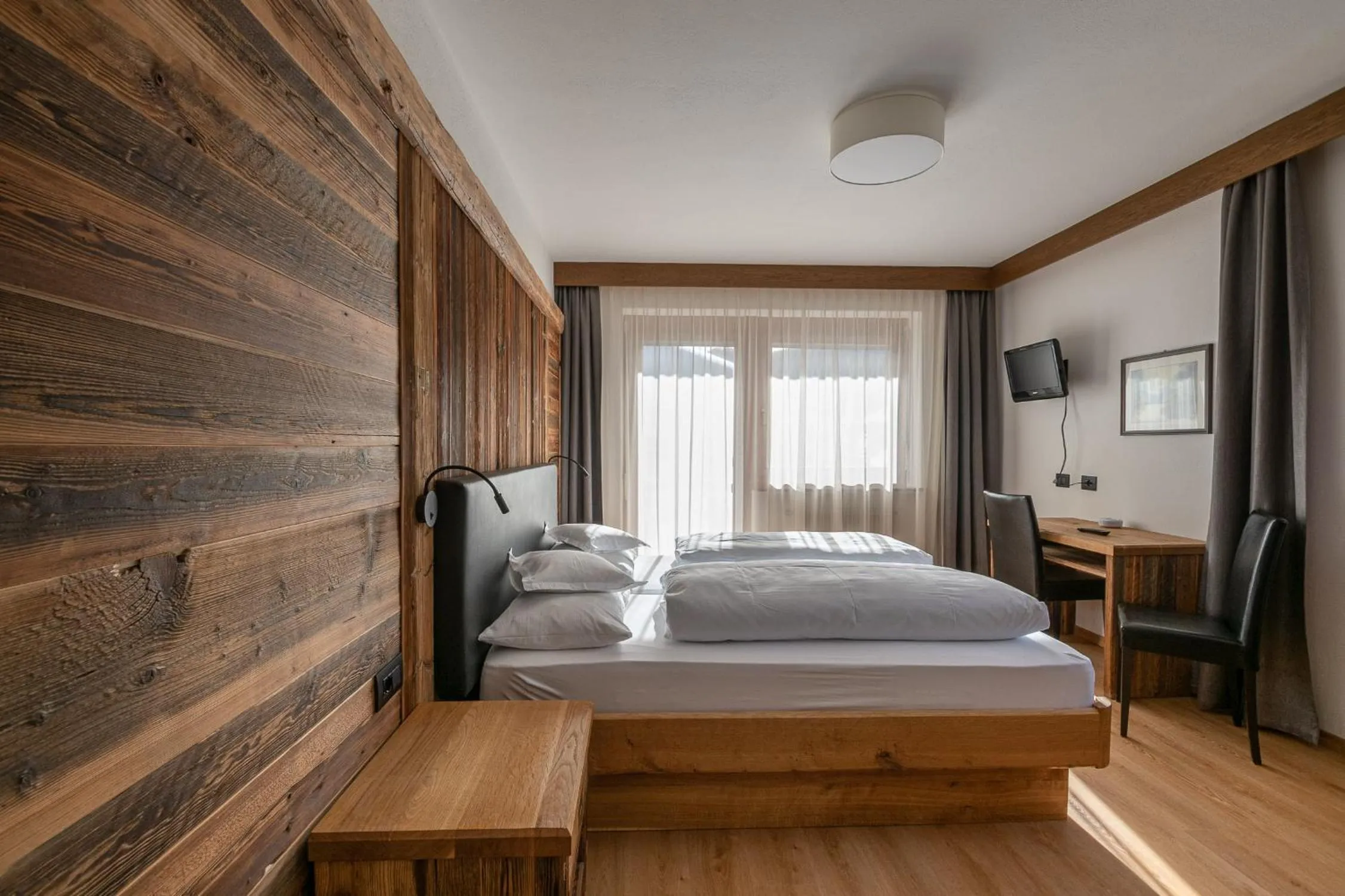 Bed in Garni Ciasa Tamà Sas di Pezzedi Eriberto e Neumair Hermine