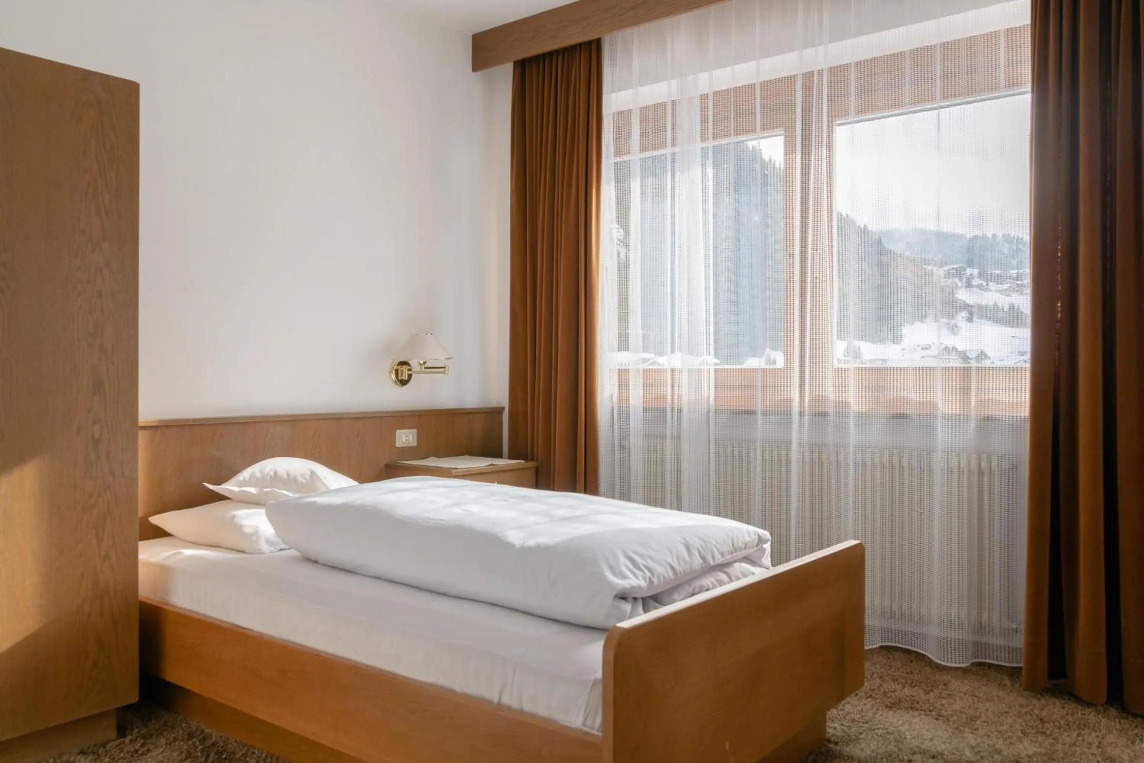 Bed in Garni Ciasa Tamà Sas di Pezzedi Eriberto e Neumair Hermine