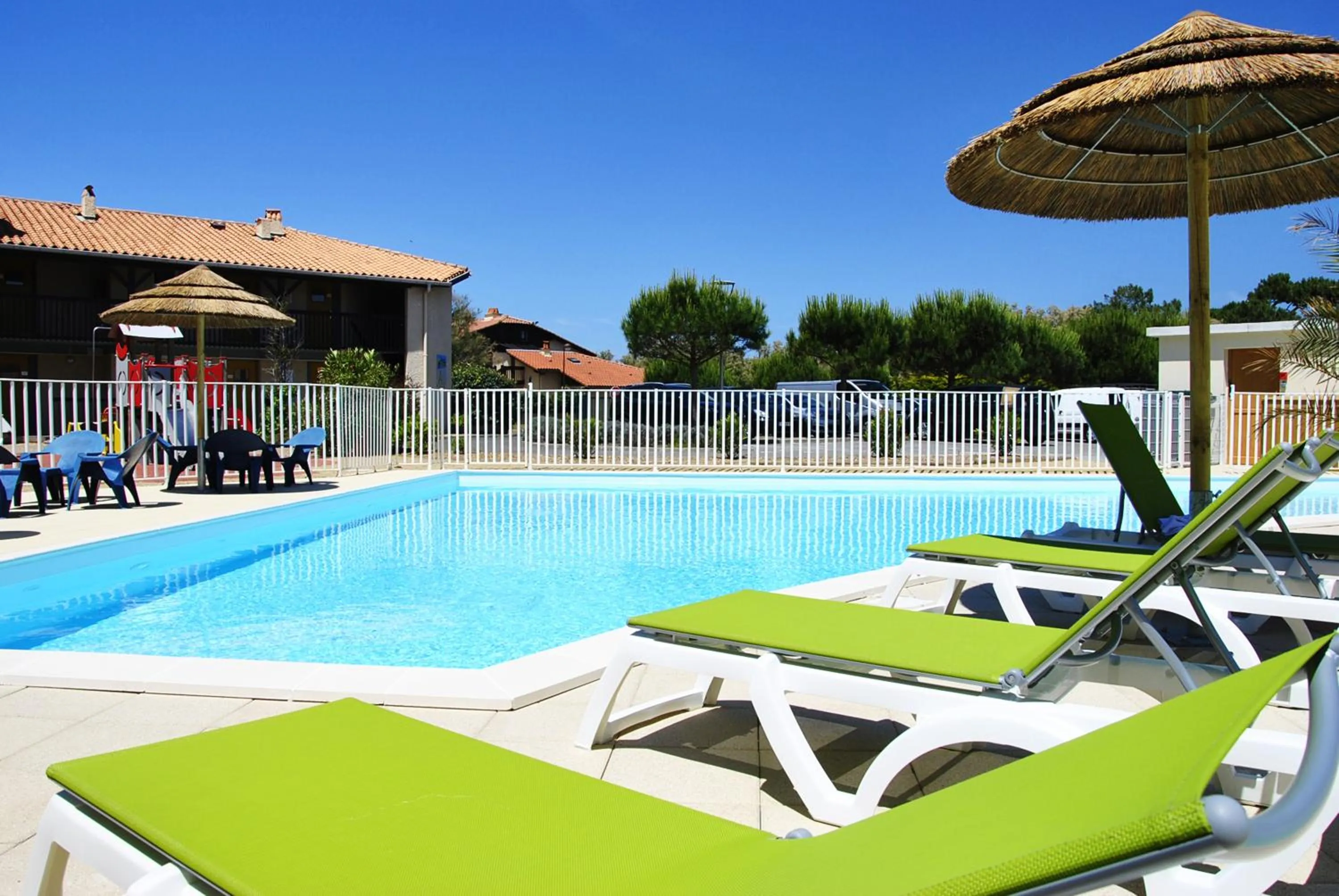 Swimming pool in Village Vacances Le Junka