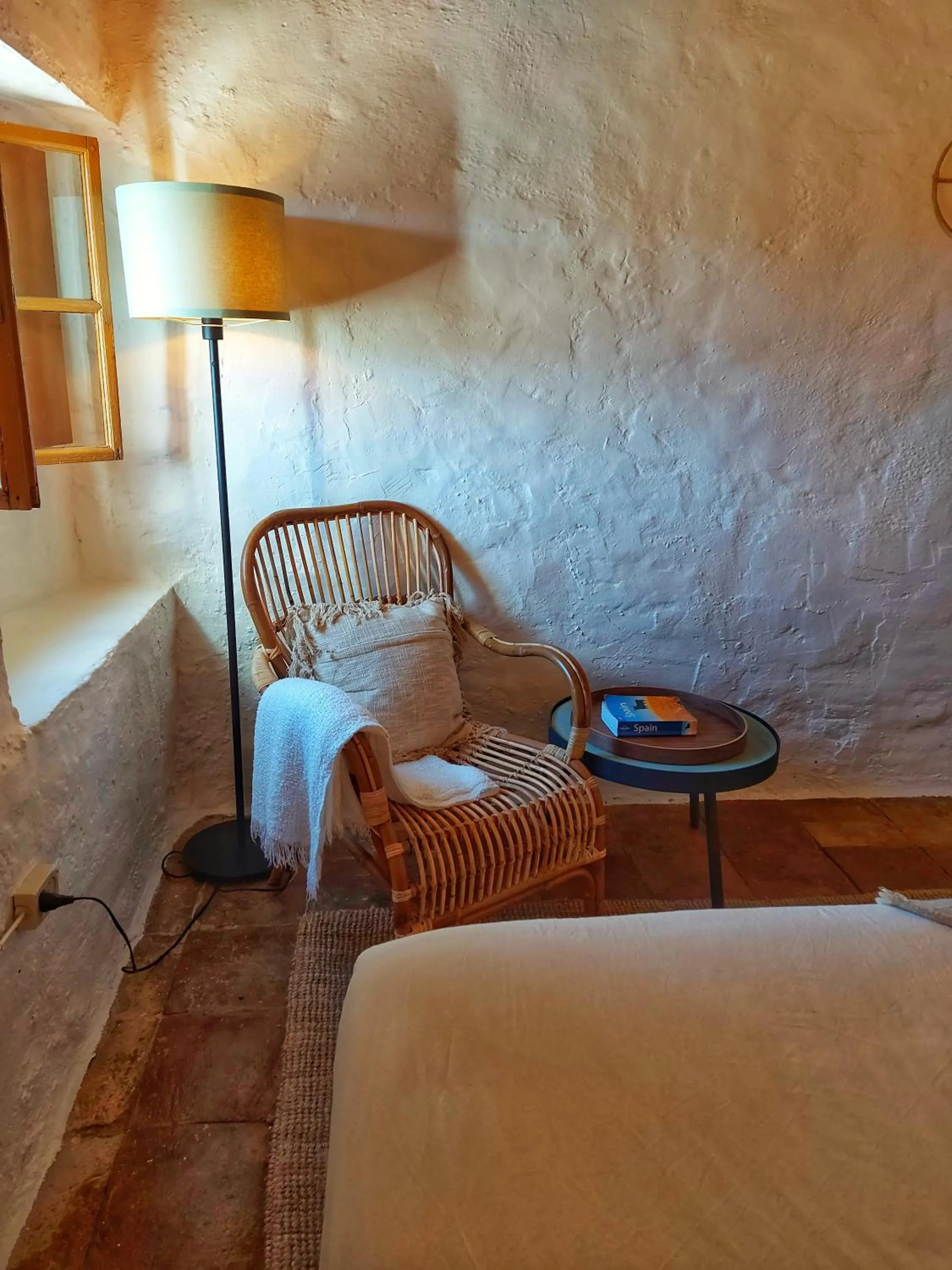 Seating area, Bed in Finca Serrato