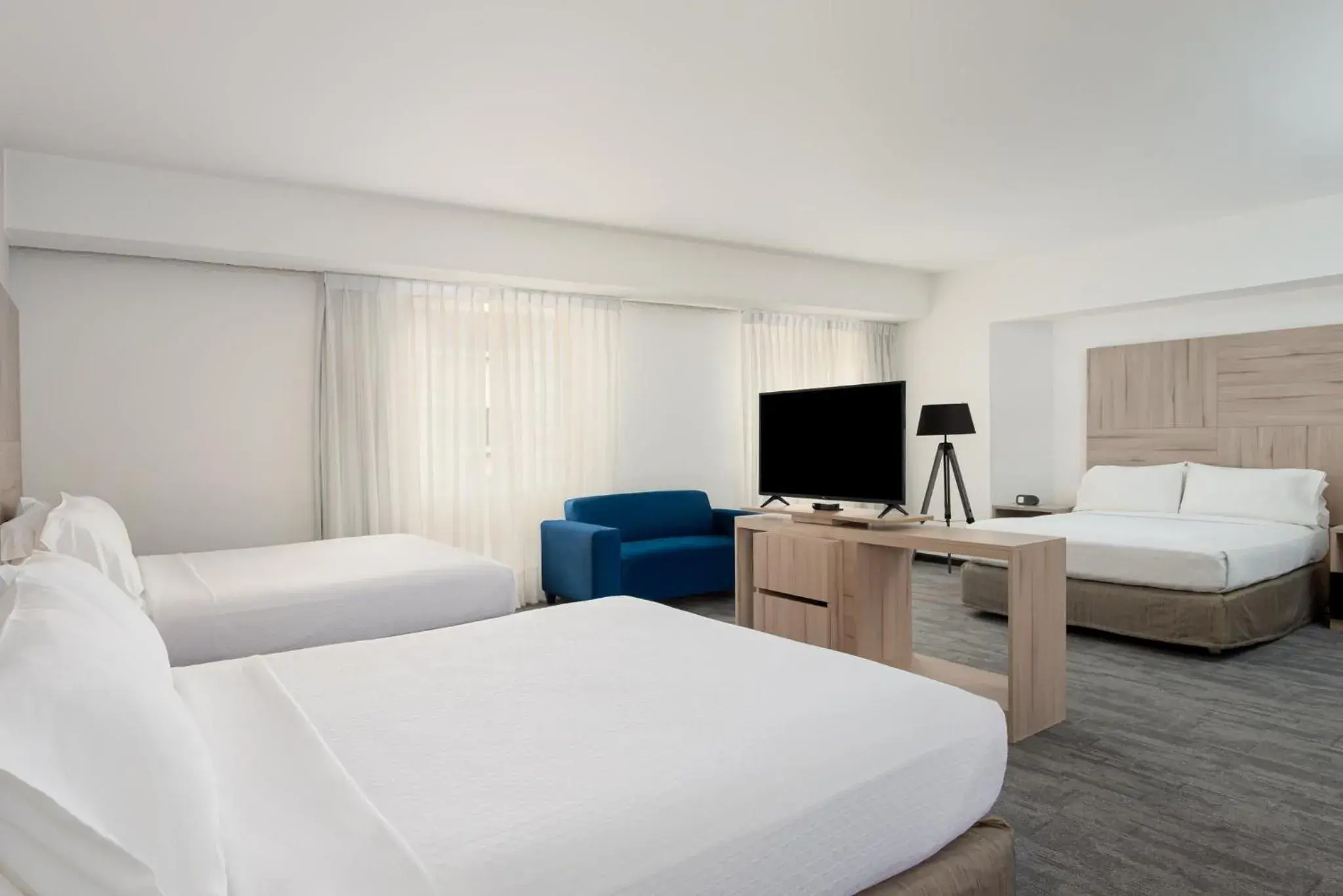 Premium Double Room with Three Double Beds and City View in Crowne Plaza Lima by IHG Premium Double Room with Three Double Beds and City View in Crowne Plaza Lima by IHG