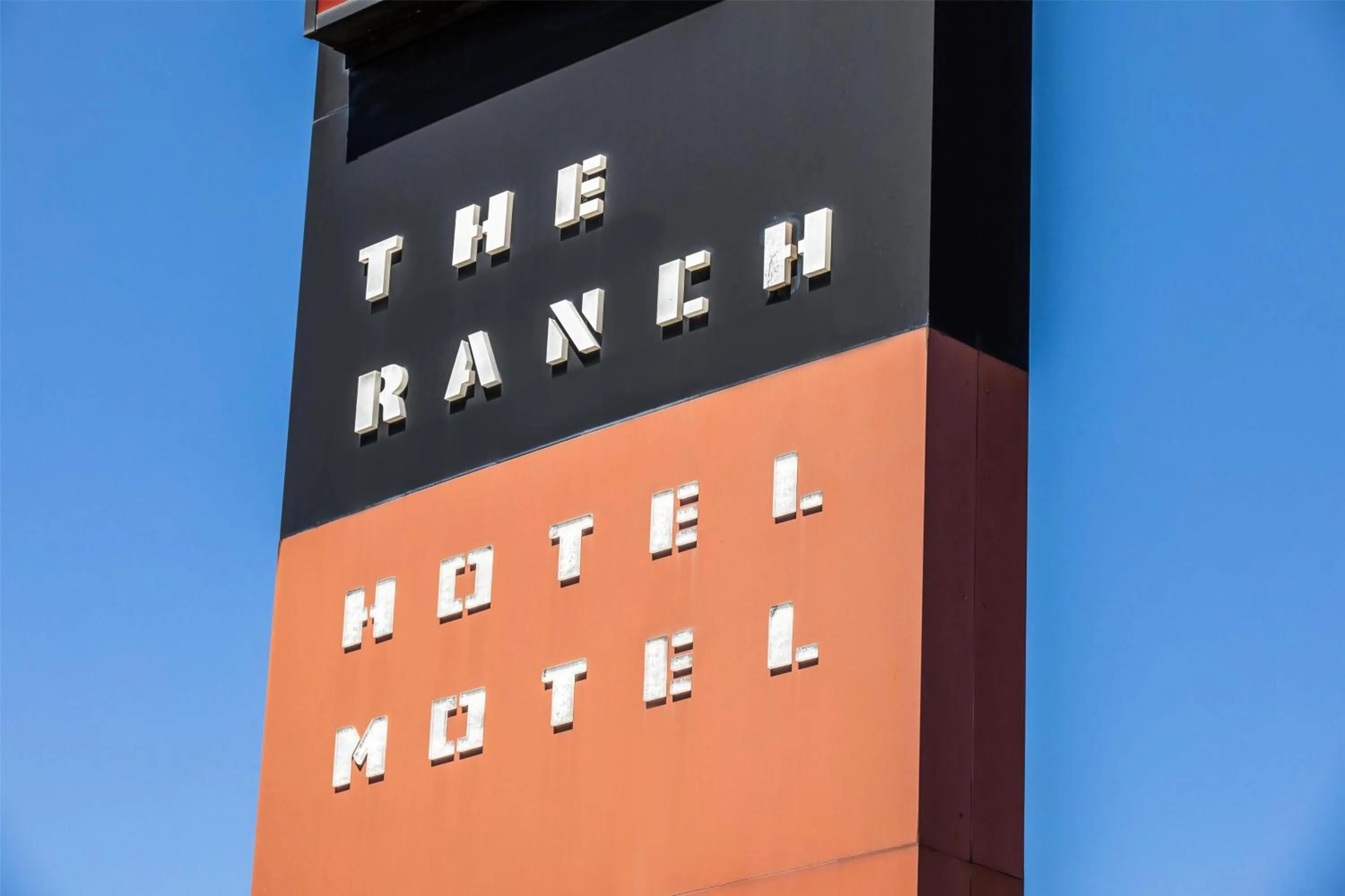Property logo or sign in Nightcap at the Ranch Hotel