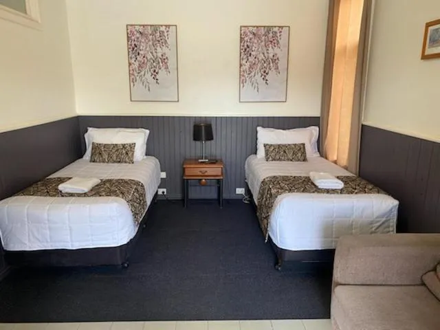 Bed in The Esplanade Motel