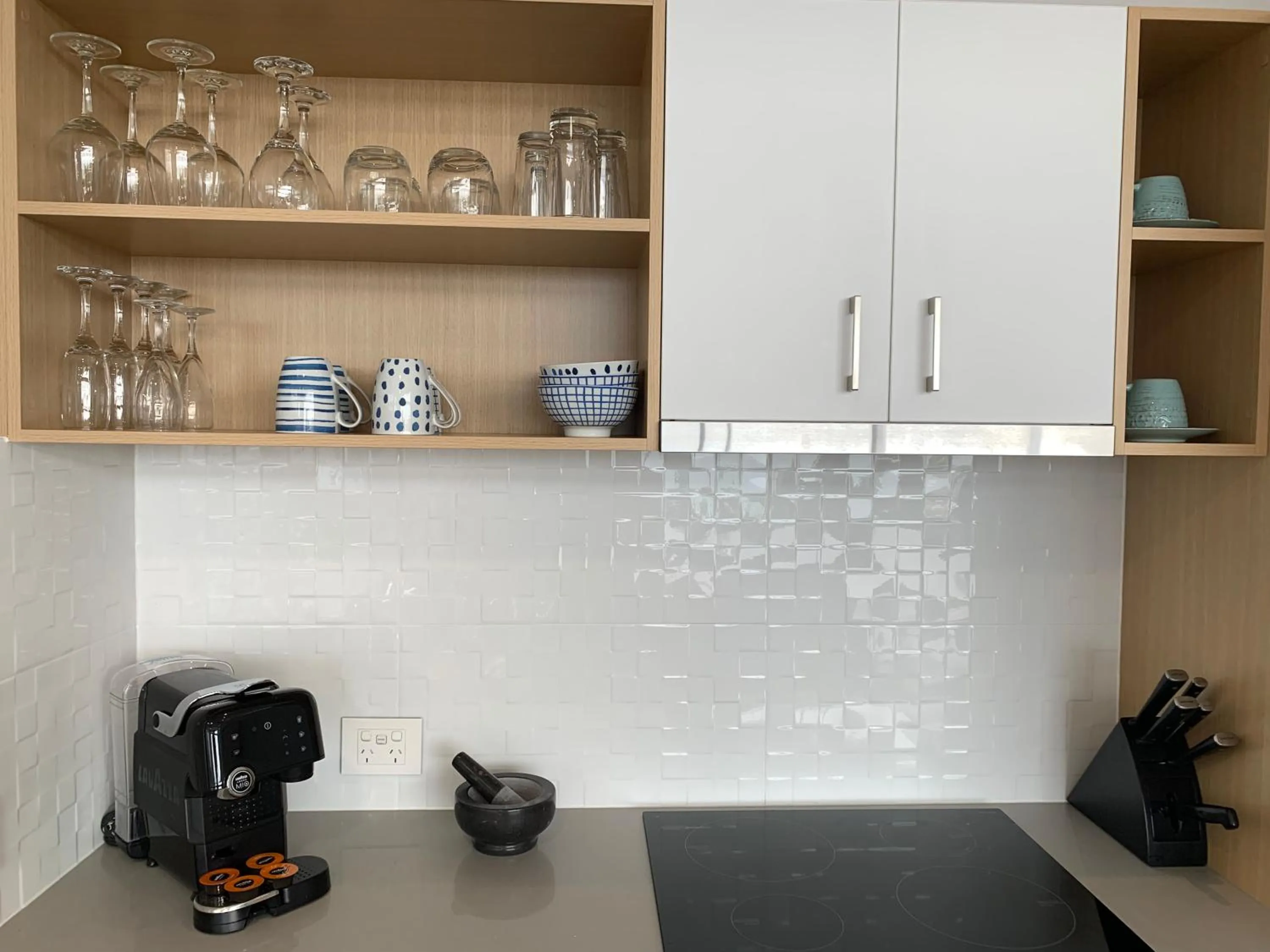 Kitchen or kitchenette in Aqua Promenade Beachfront Holiday Apartments