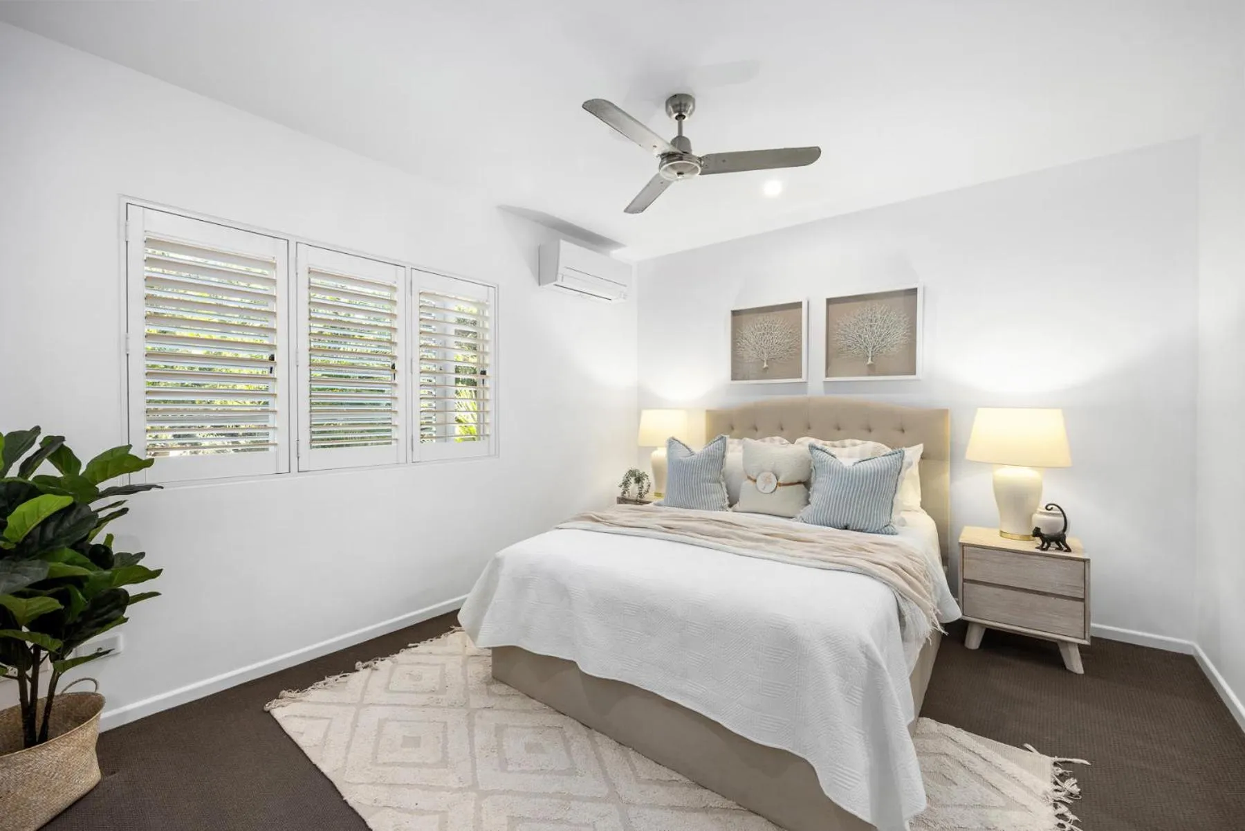 Bed in Aqua Promenade Beachfront Holiday Apartments