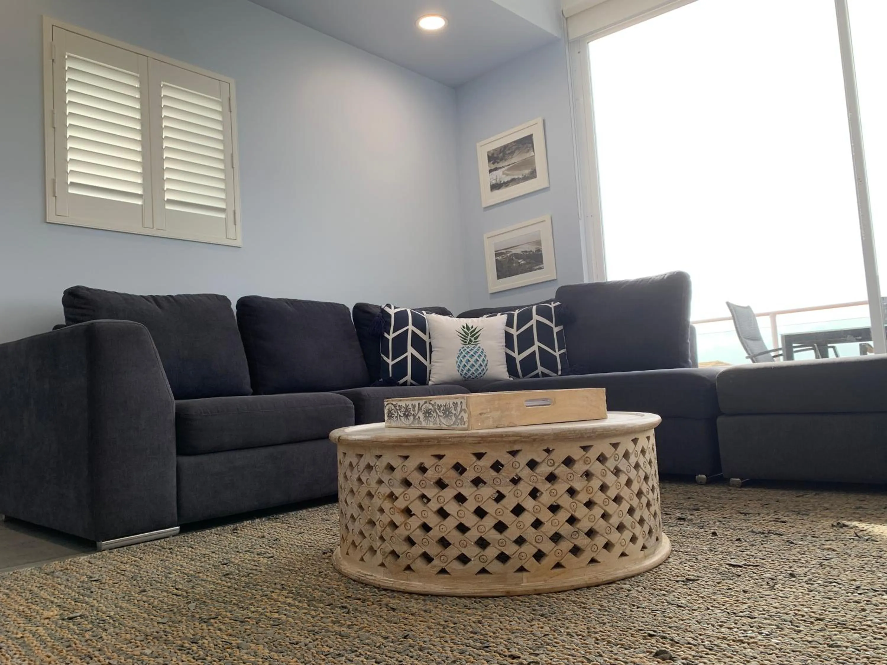 Living room in Aqua Promenade Beachfront Holiday Apartments