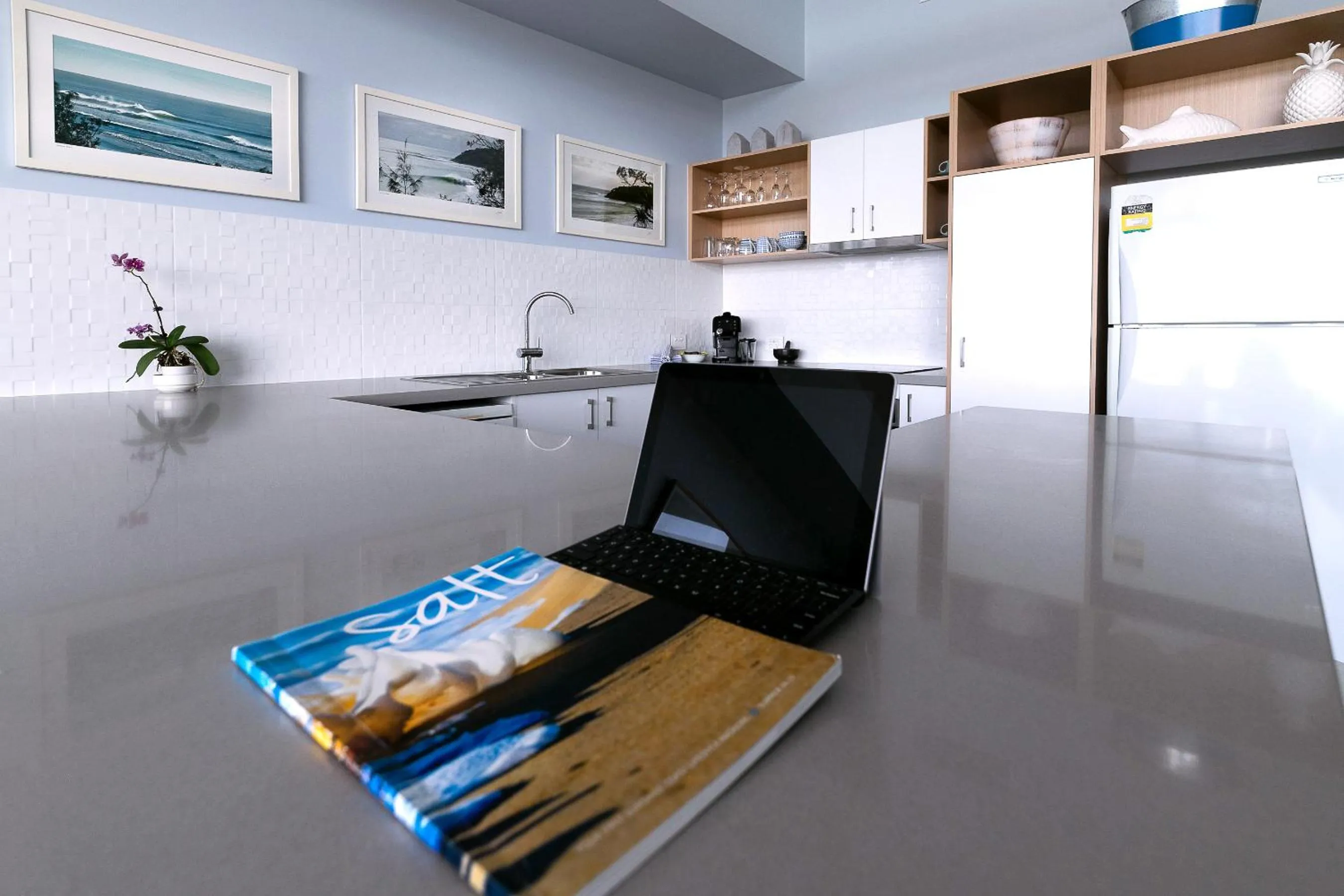 Kitchen or kitchenette in Aqua Promenade Beachfront Holiday Apartments