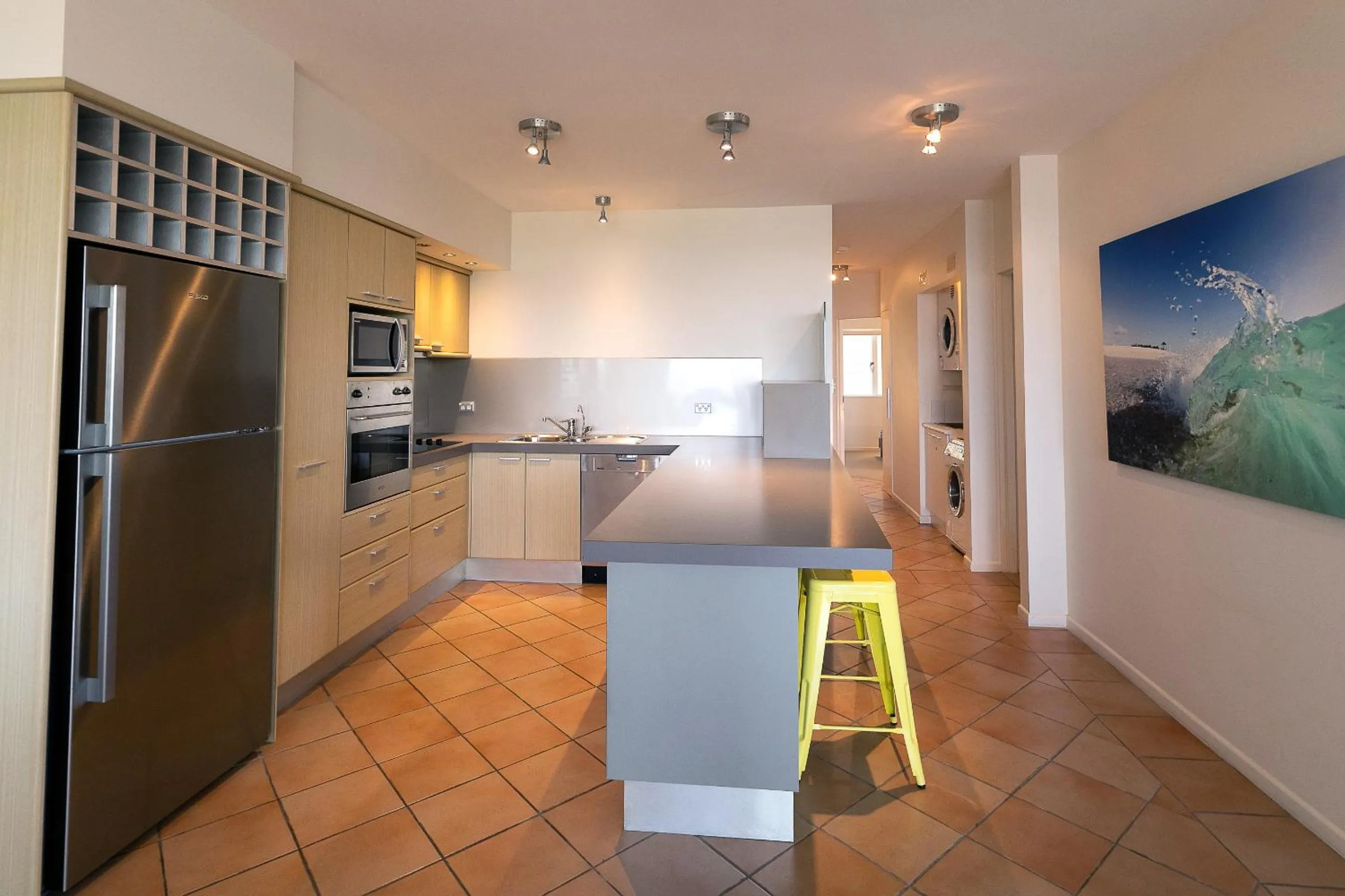 Kitchen or kitchenette in Aqua Promenade Beachfront Holiday Apartments