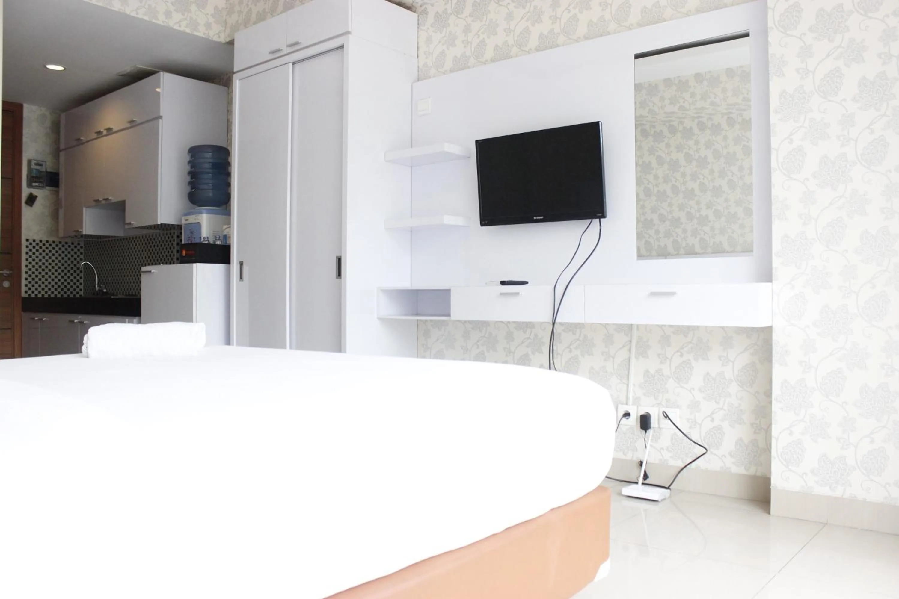 Bed in Relaxing Studio near ITB at Beverly Dago Apartment By Travelio
