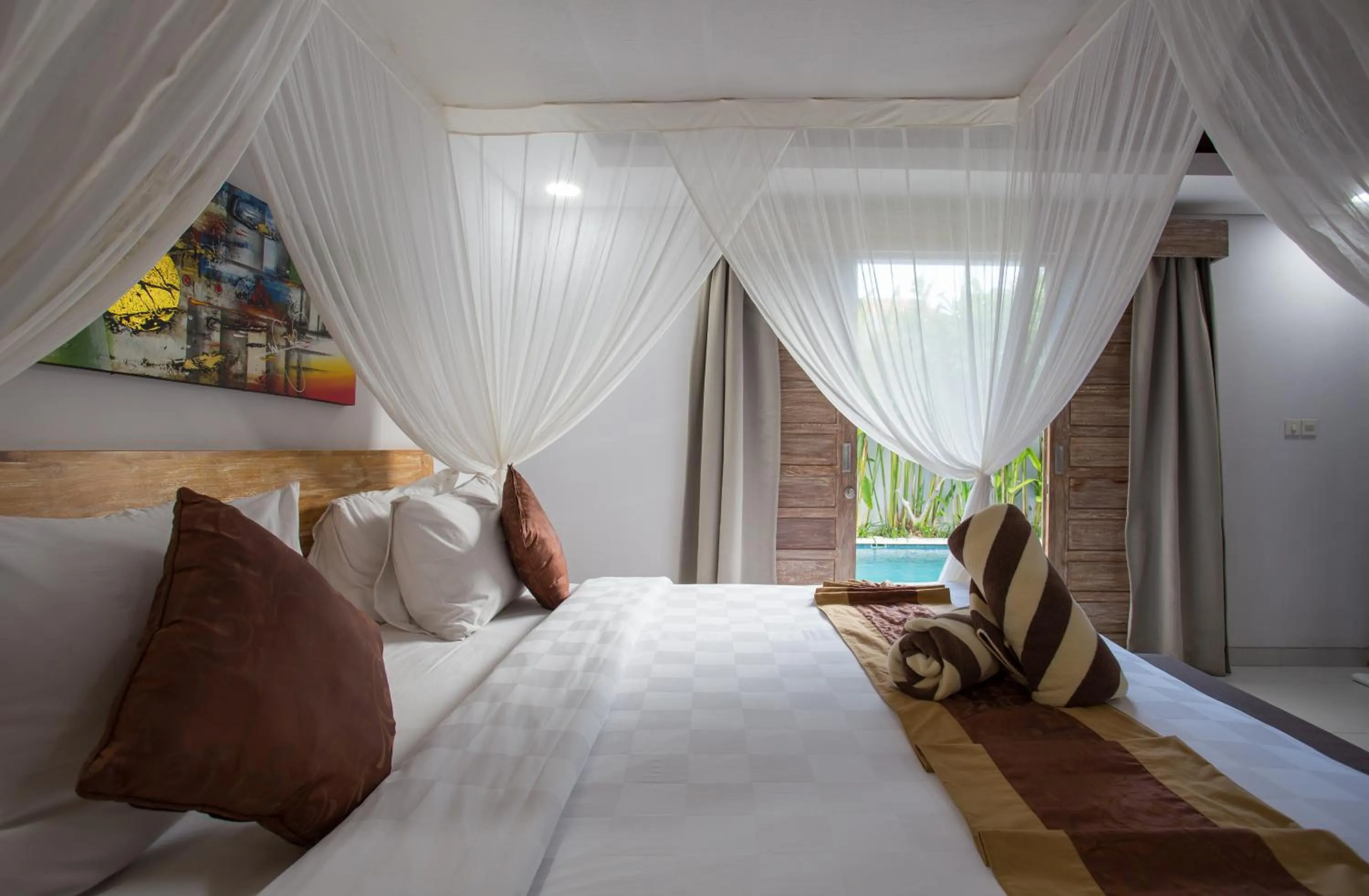 Photo of the whole room, Bed in The Awandari Villas Seminyak - CHSE Certified