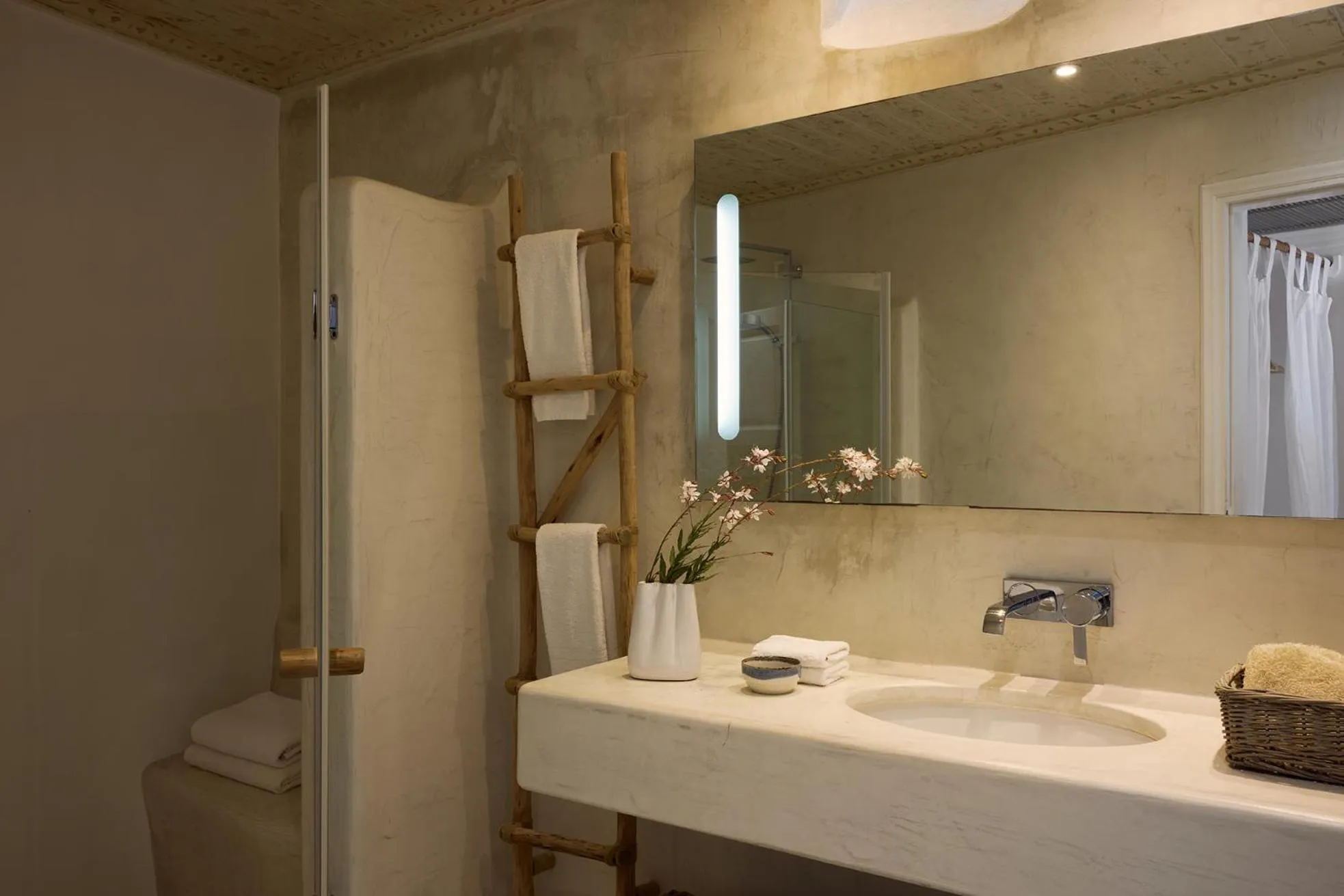 Bathroom in Iconic Santorini, a Boutique Cave Hotel by Sandglass