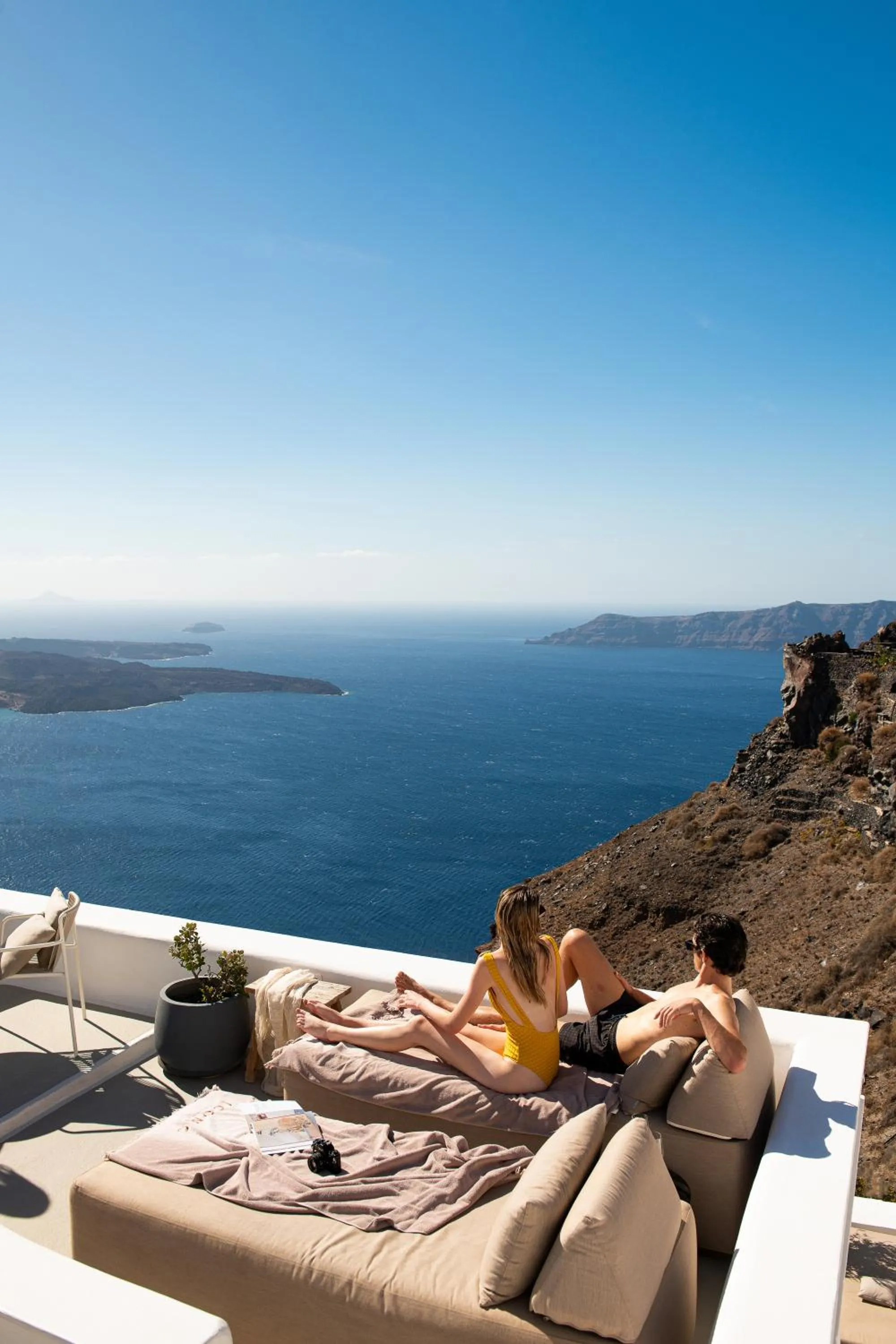 People in Iconic Santorini, a Boutique Cave Hotel by Sandglass