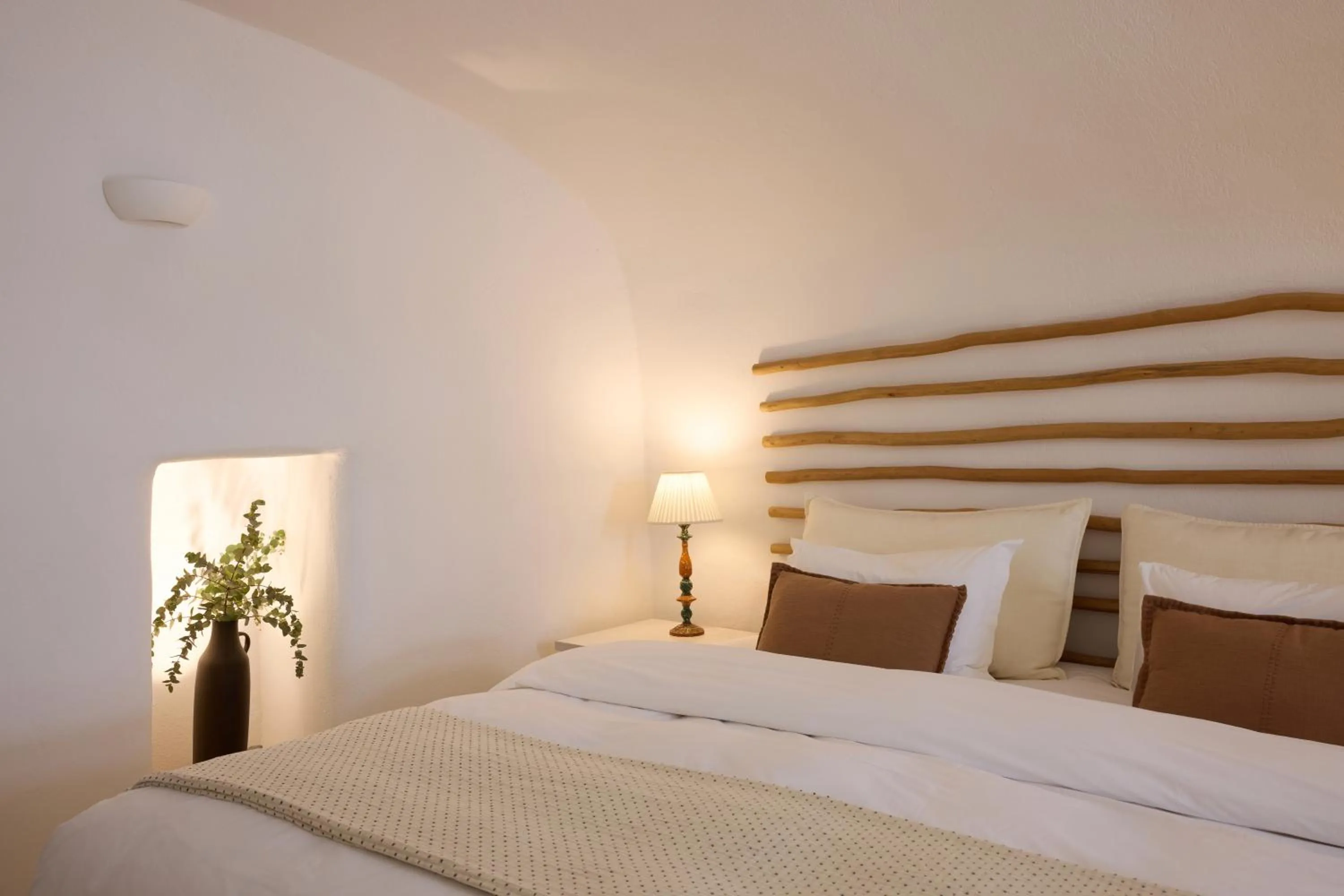 Bed in Iconic Santorini, a Boutique Cave Hotel by Sandglass