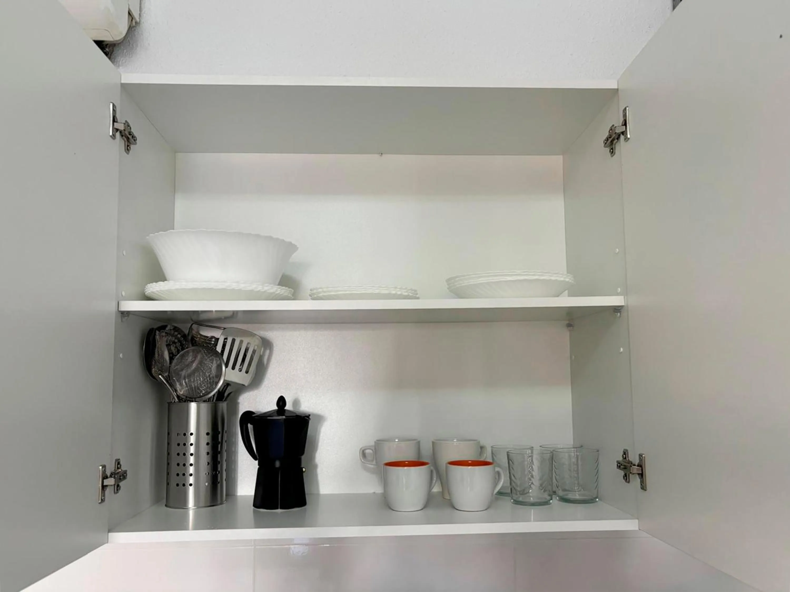 Kitchen or kitchenette in Apartamentos Doña Carmen 3000