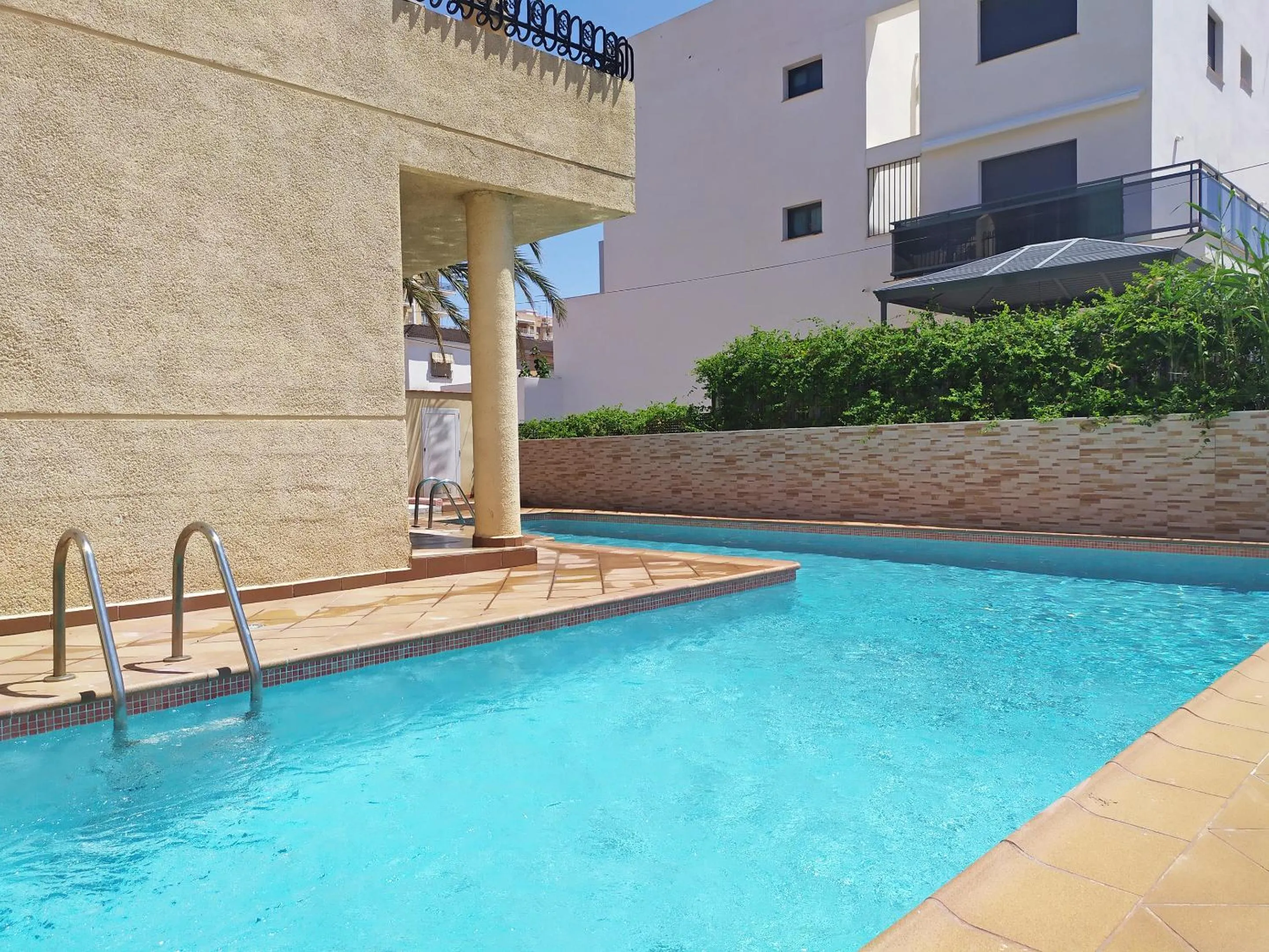 Swimming pool in Apartamentos Doña Carmen 3000